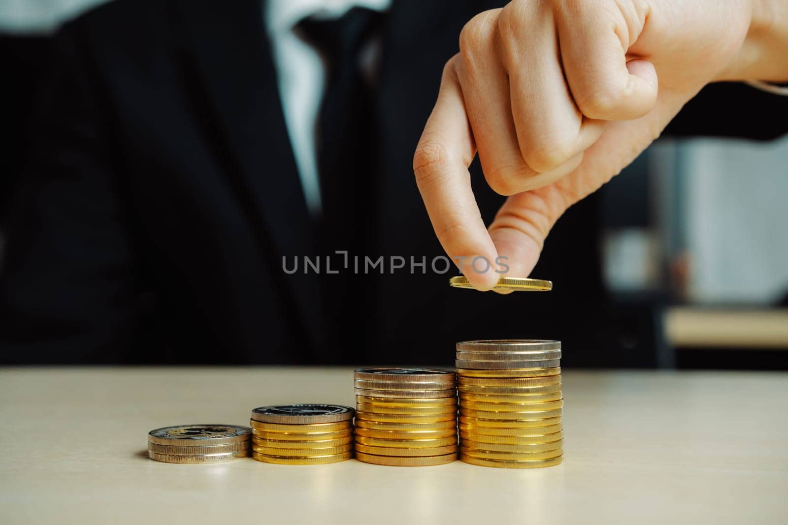 Businessman working with coin money currency. uds by biancoblue