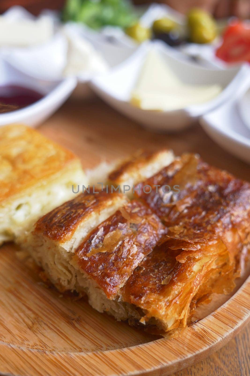 Traditional Turkish Cuisine Pastries borek on a plate by towfiq007