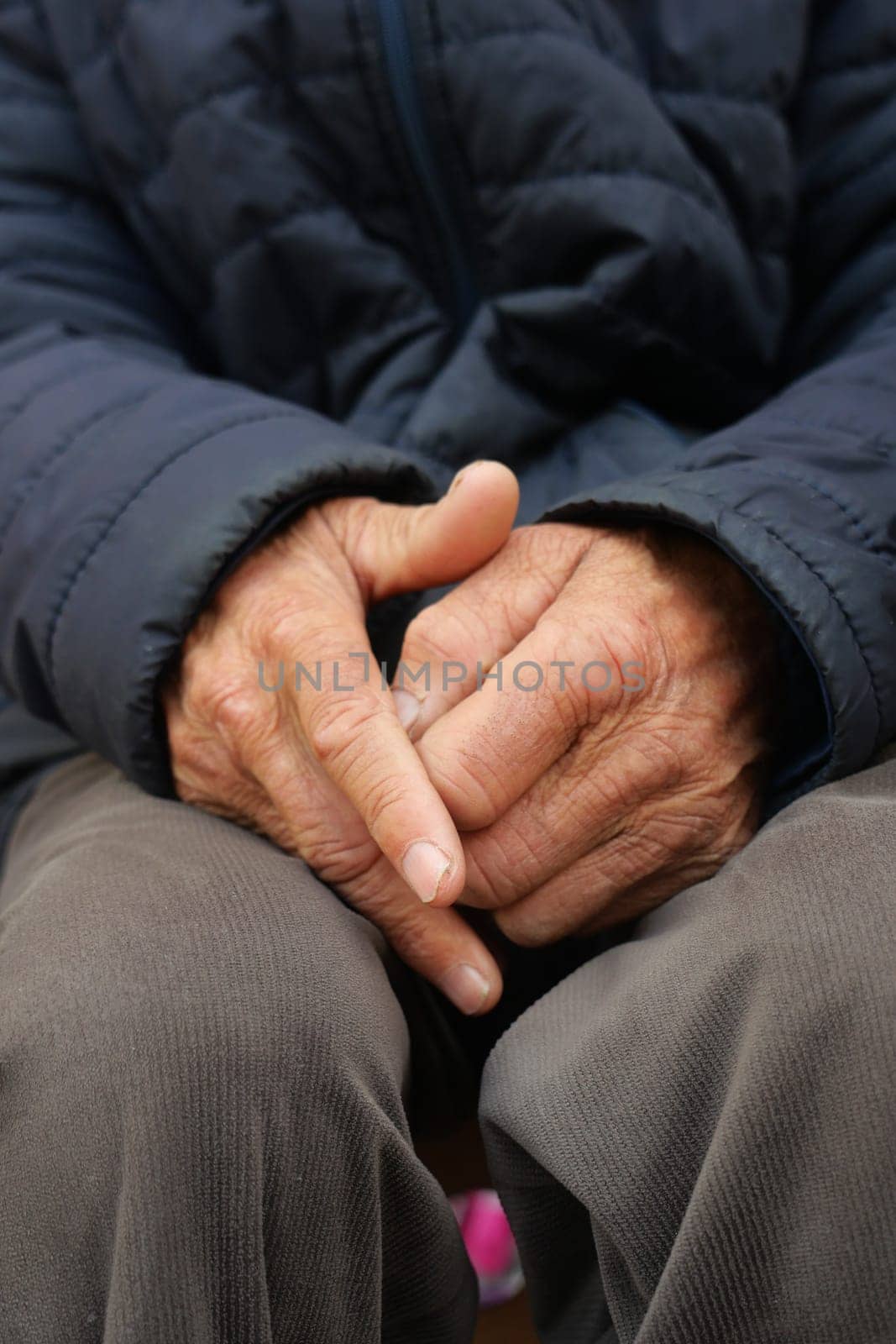 close up of hands of a elderly person by towfiq007