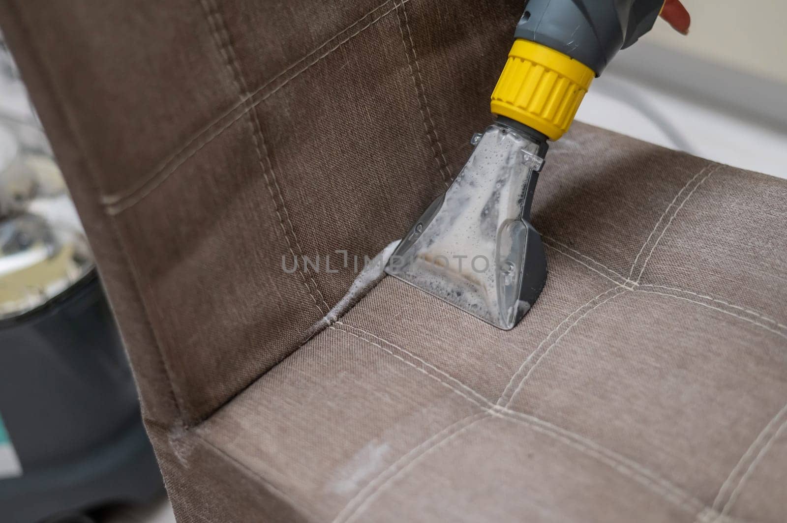Dry cleaning a fabric chair