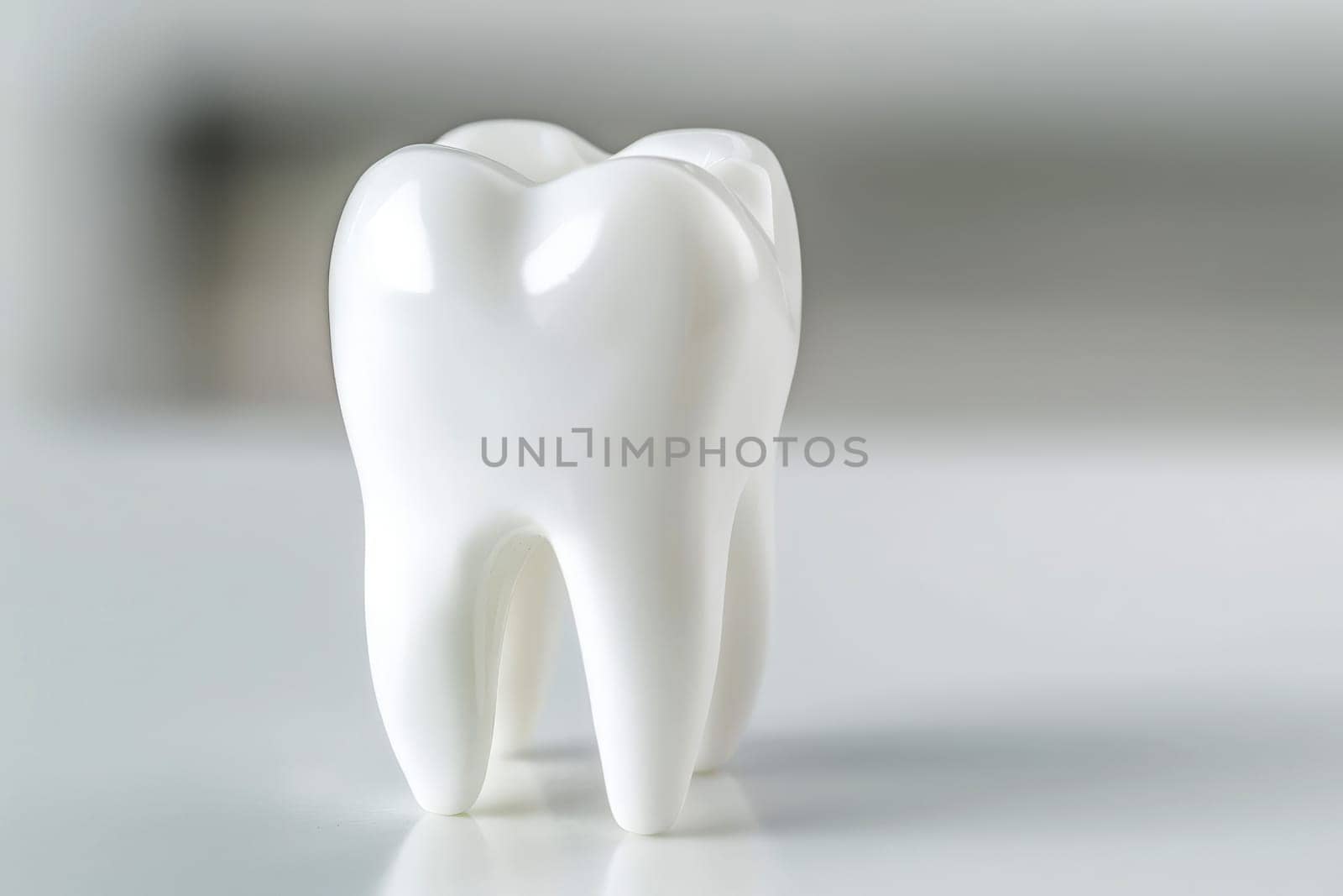 The tooth model is in front of a isolated background. Copy space, generative ai by matamnad