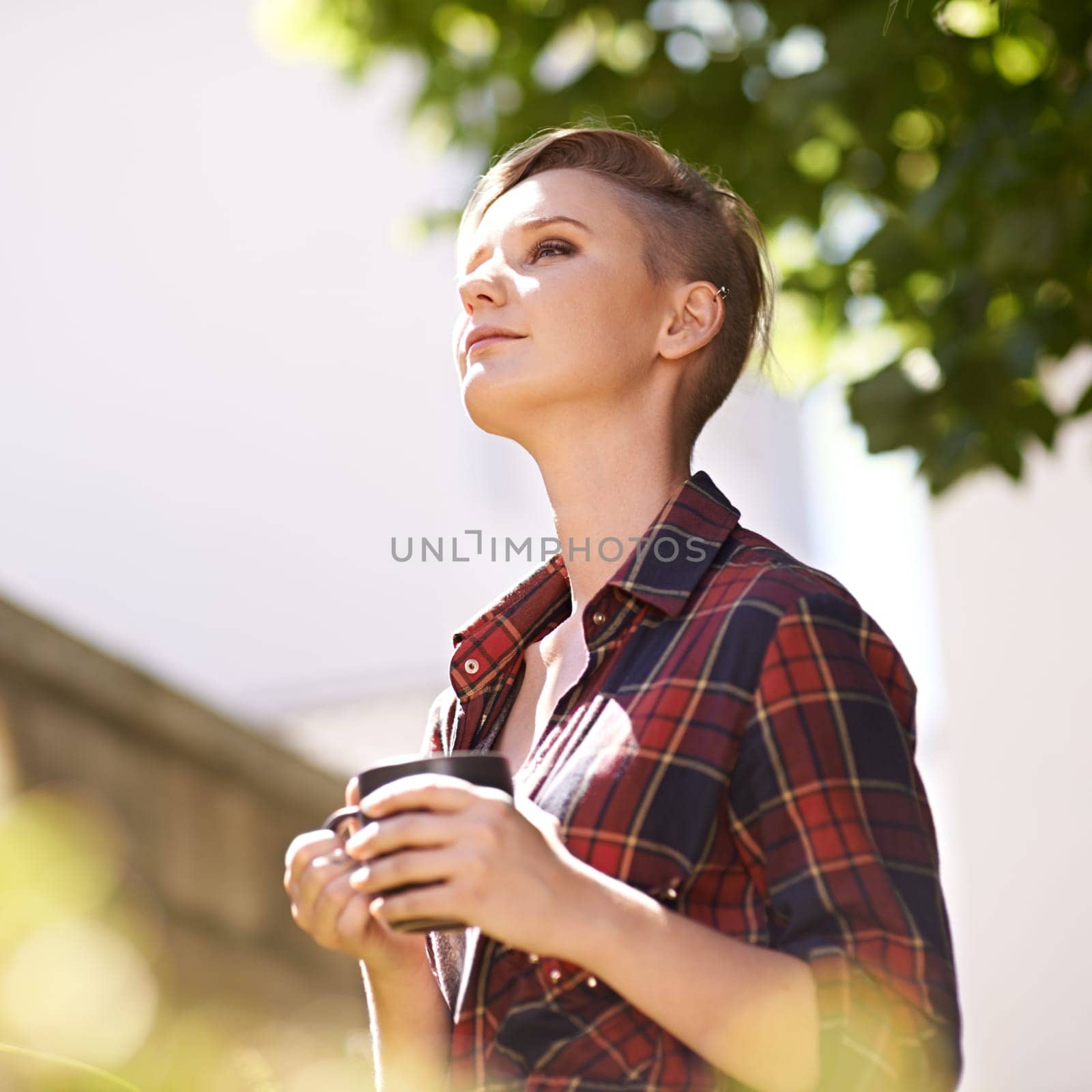 Woman, smile and thinking in garden with coffee for fresh air, peace and ideas for day in morning. Relax, summer and thoughtful female person with mug for stress relief, wellness or nature enjoyment.