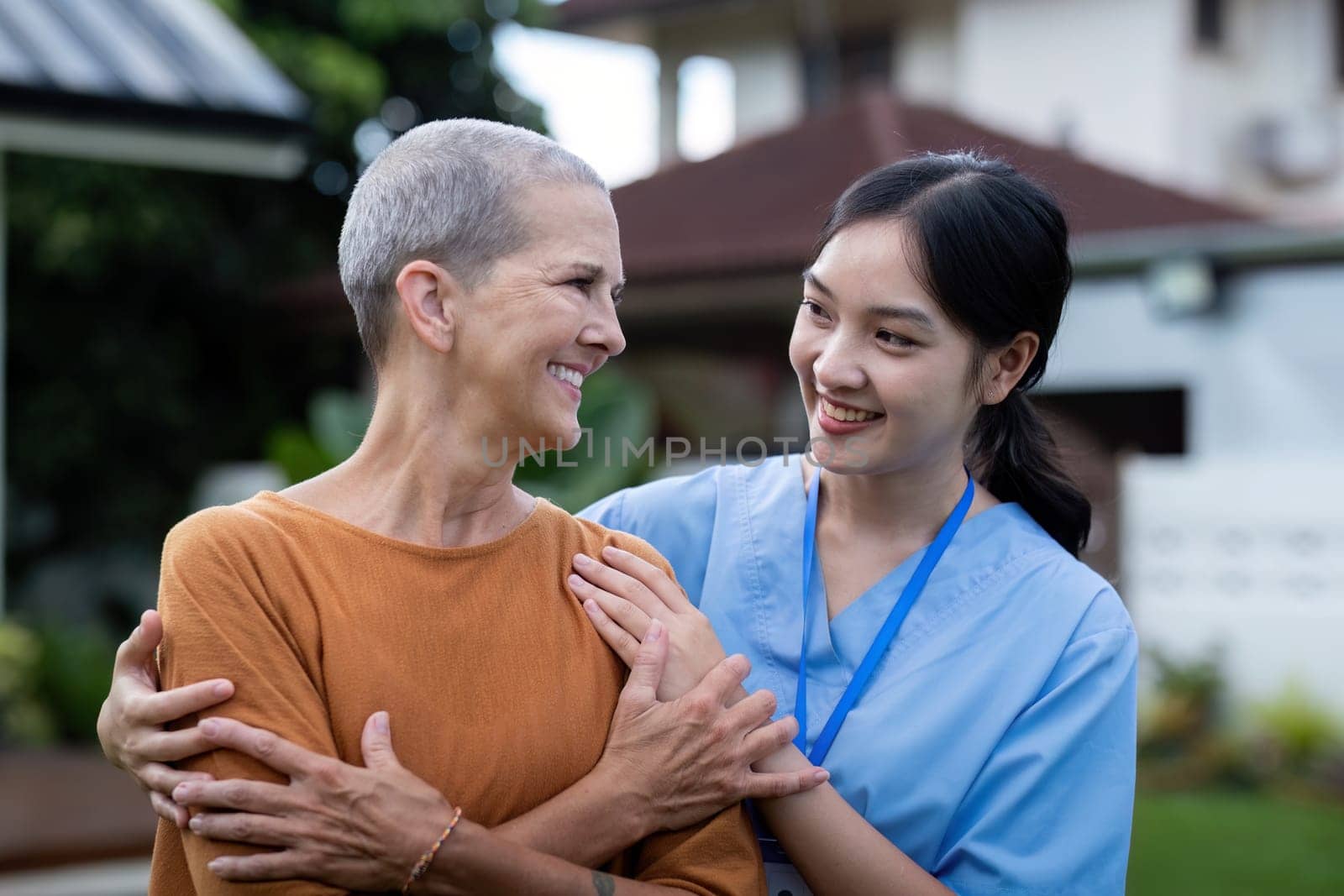 Healthcare, elderly woman with nurse or caregiver in home. Support or communication, caregiver and conversation with medical person with senior or old female.