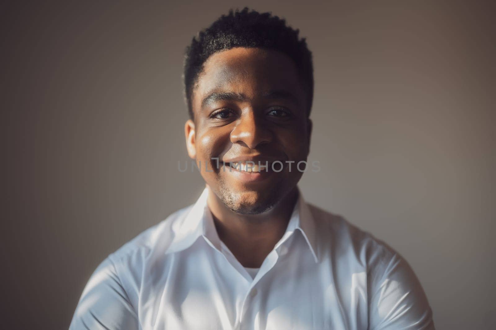 Portrait of happy man who is smiling and looking at camera.