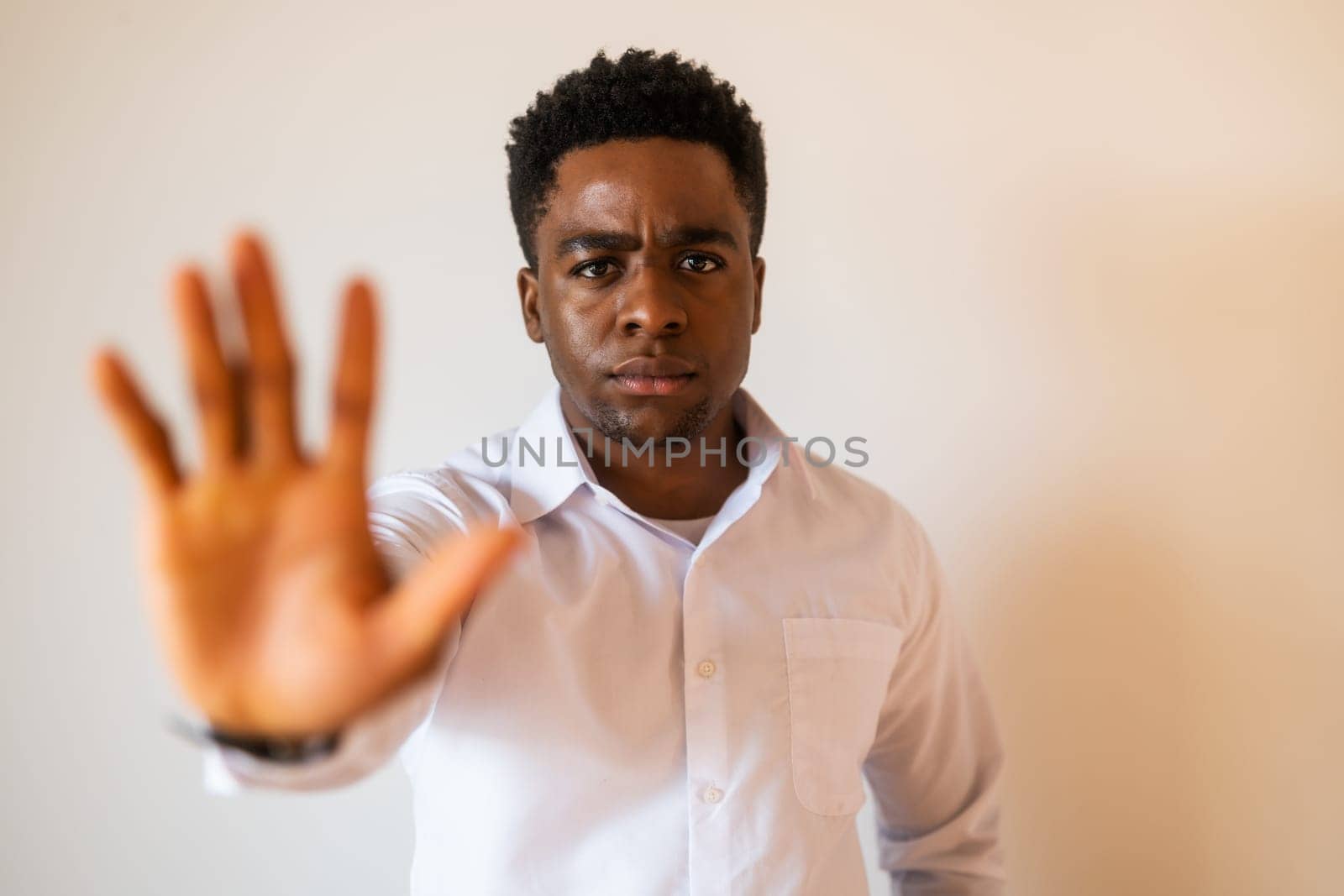 Portrait of young businessman who is serious and pause by djoronimo