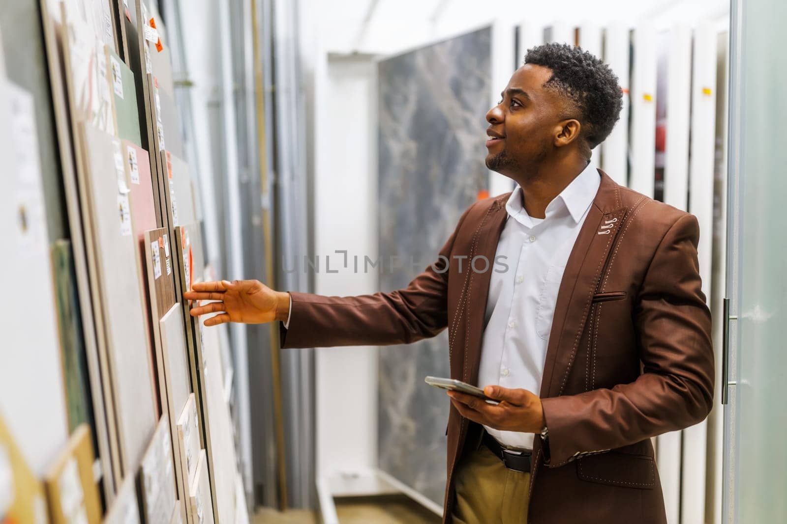 Portrait of buyer in bathroom store by djoronimo