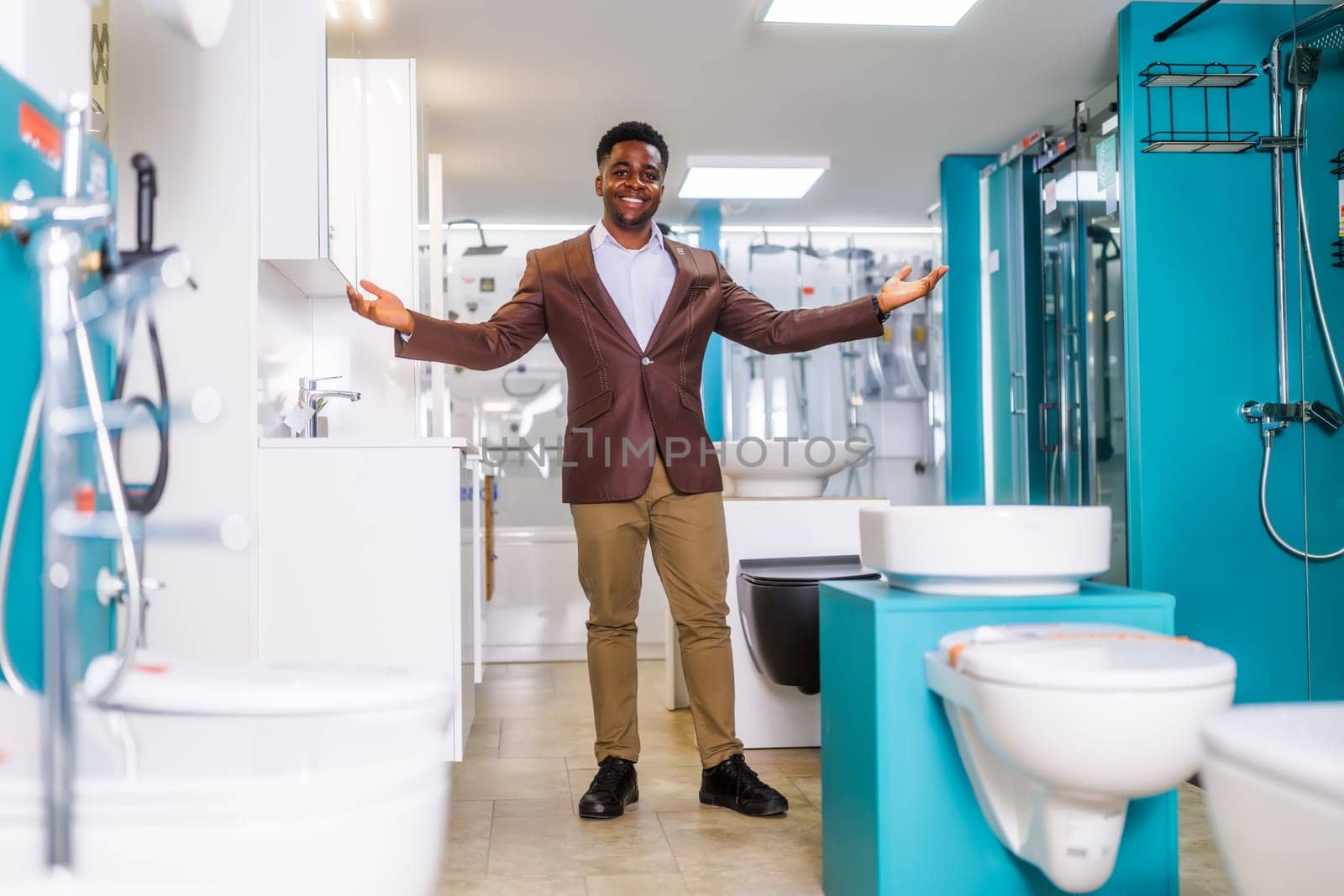 Portrait of salesperson in bathroom store by djoronimo