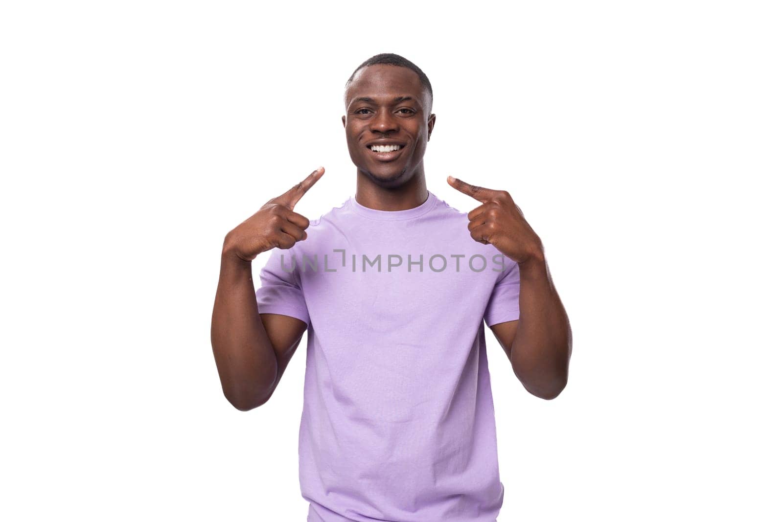 young african man of normal build dressed in a basic light lilac t-shirt with print mockup by TRMK