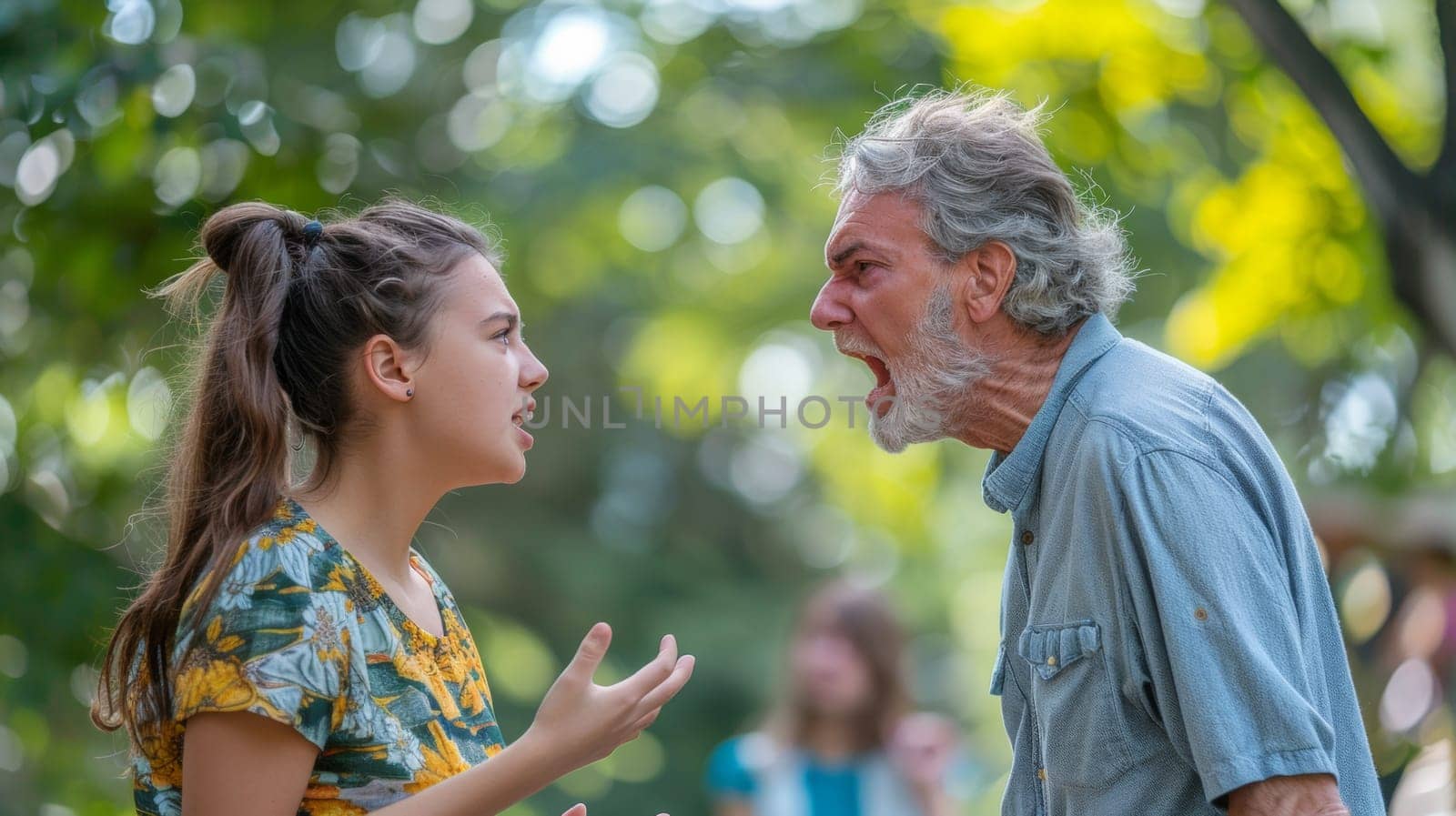 A man and woman standing in front of each other with trees behind them