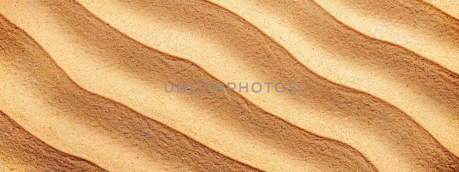Close-up of the detailed sandy dunes texture with natural wavy patterns and earth tones, perfect for background, wallpaper, or abstract nature surface in a warm, arid outdoor environment