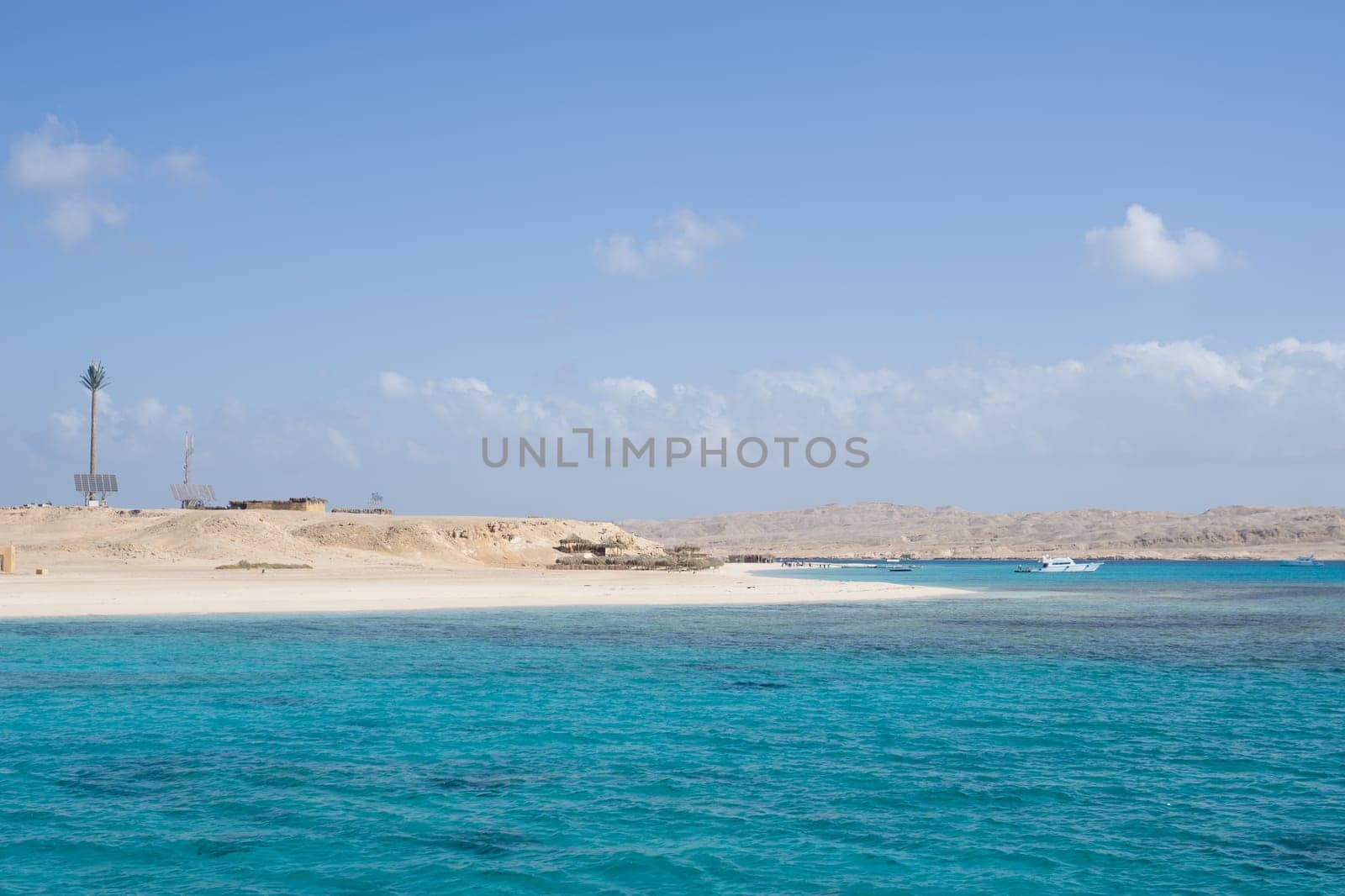 Beach Relaxation at the Red Sea. Fairy-tale Moments of a Sunny Day. The concept of tourism and sea travel.