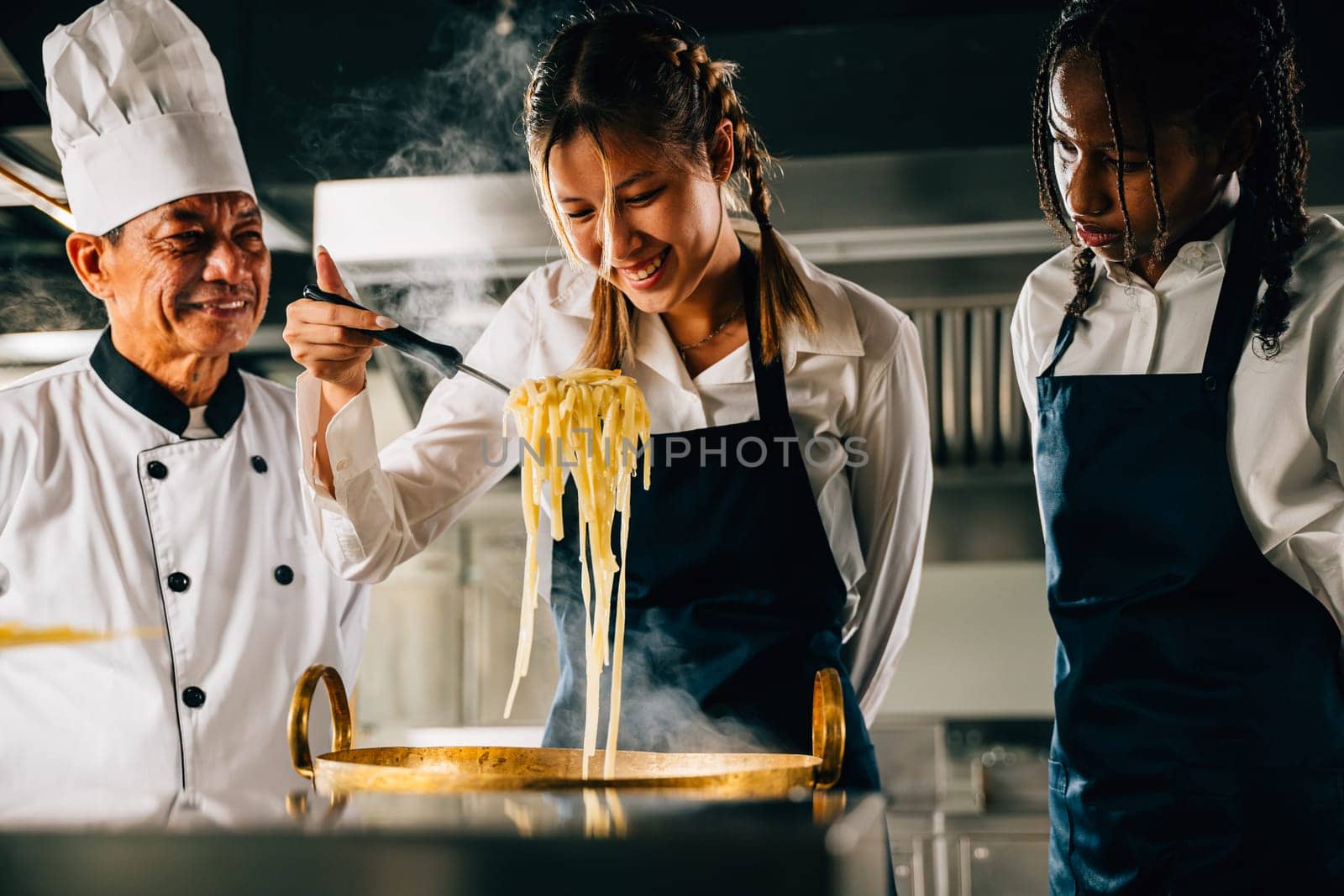 Chef instructs kids cooking noodle in kitchen. Schoolgirls in uniform create ramen soup. Teacher guides smiling students. Modern education seen in making dinner. Foor Education Concept by Sorapop