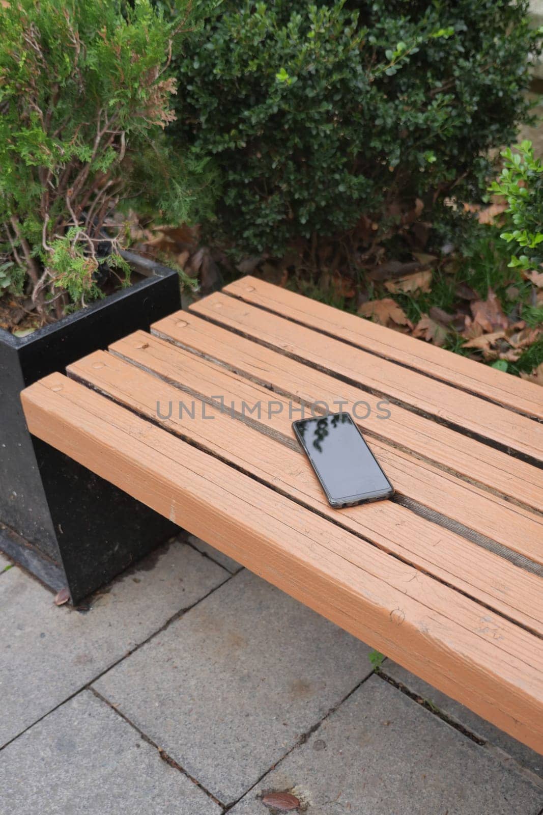 forget smartphone on a park bench, lost smart phone by towfiq007