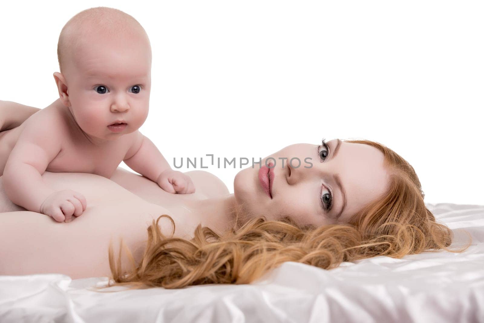 Image of affectionate mother and toddler on her chest