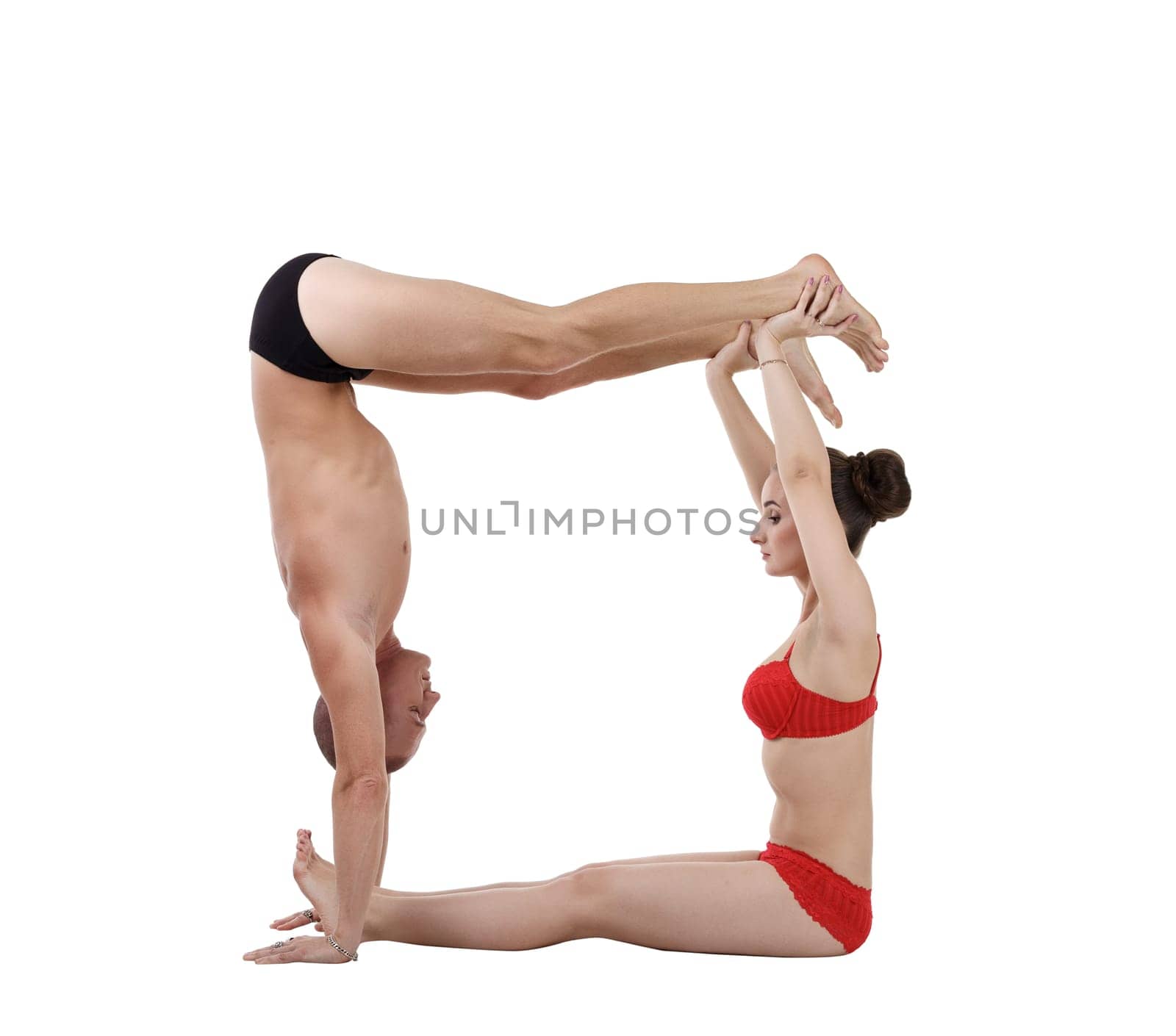 Flexible yogis formed letter 'O' with their bodies. Isolated on white background