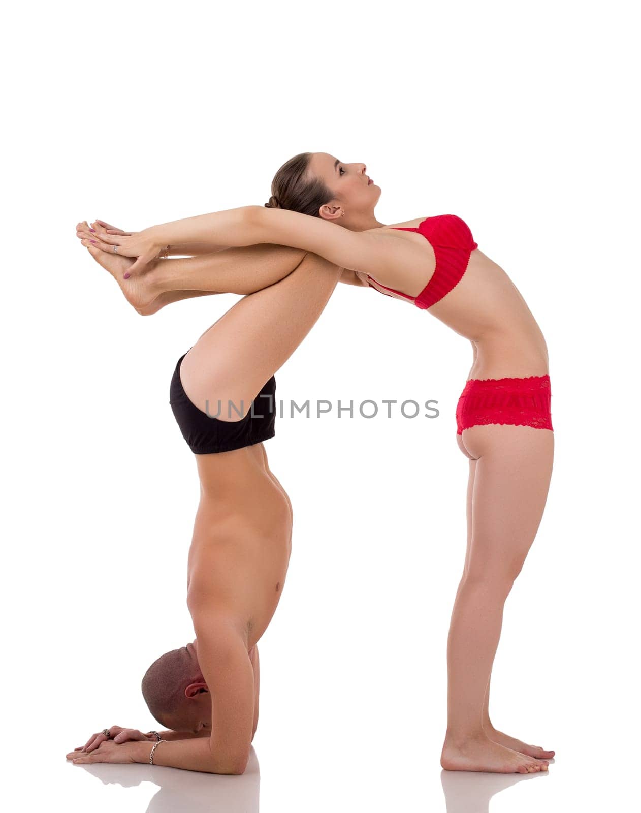 Paired yoga. Bodies of people form figure. Isolated on white