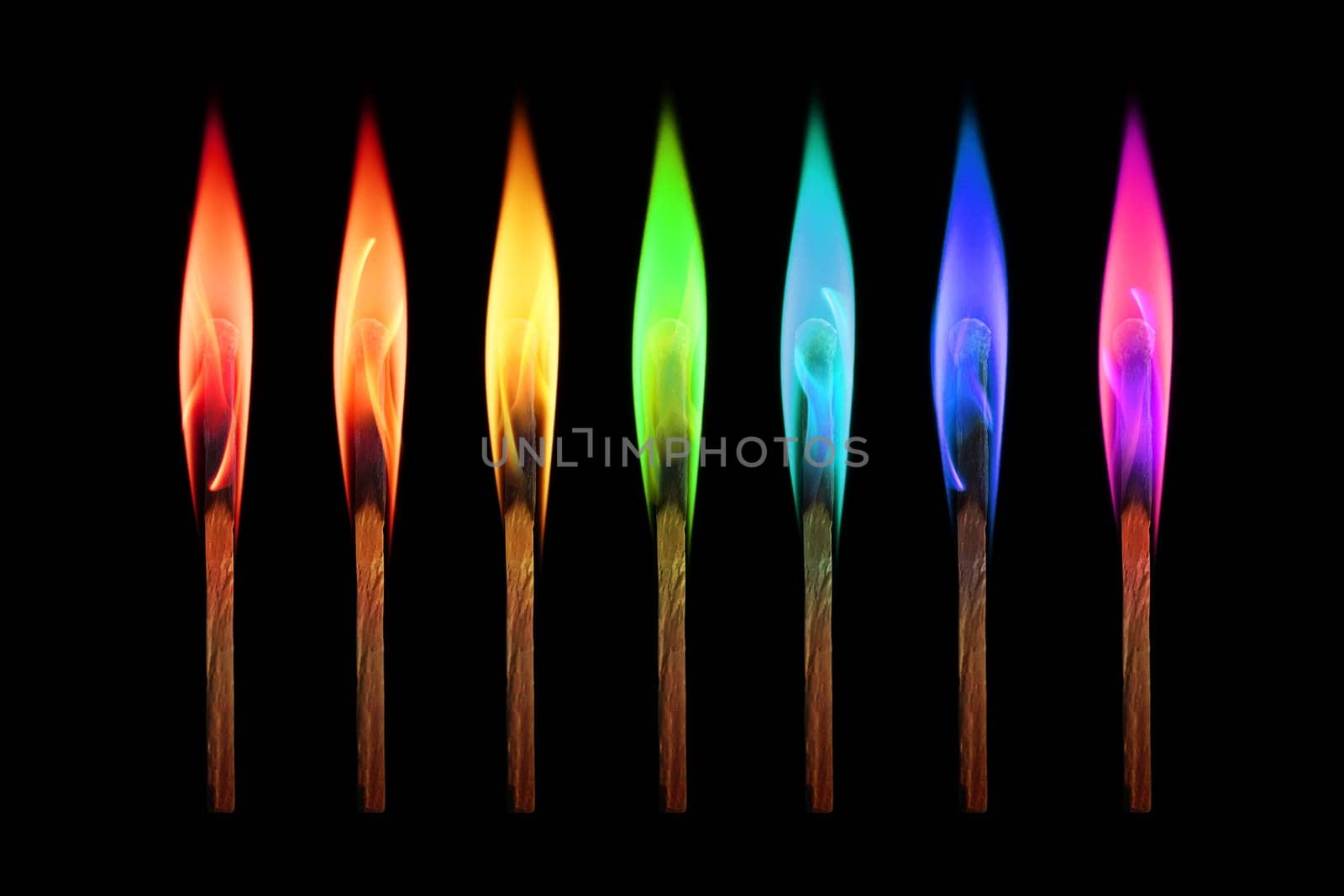 Matches burning in the rainbow colors flames on black background. Individuality concept