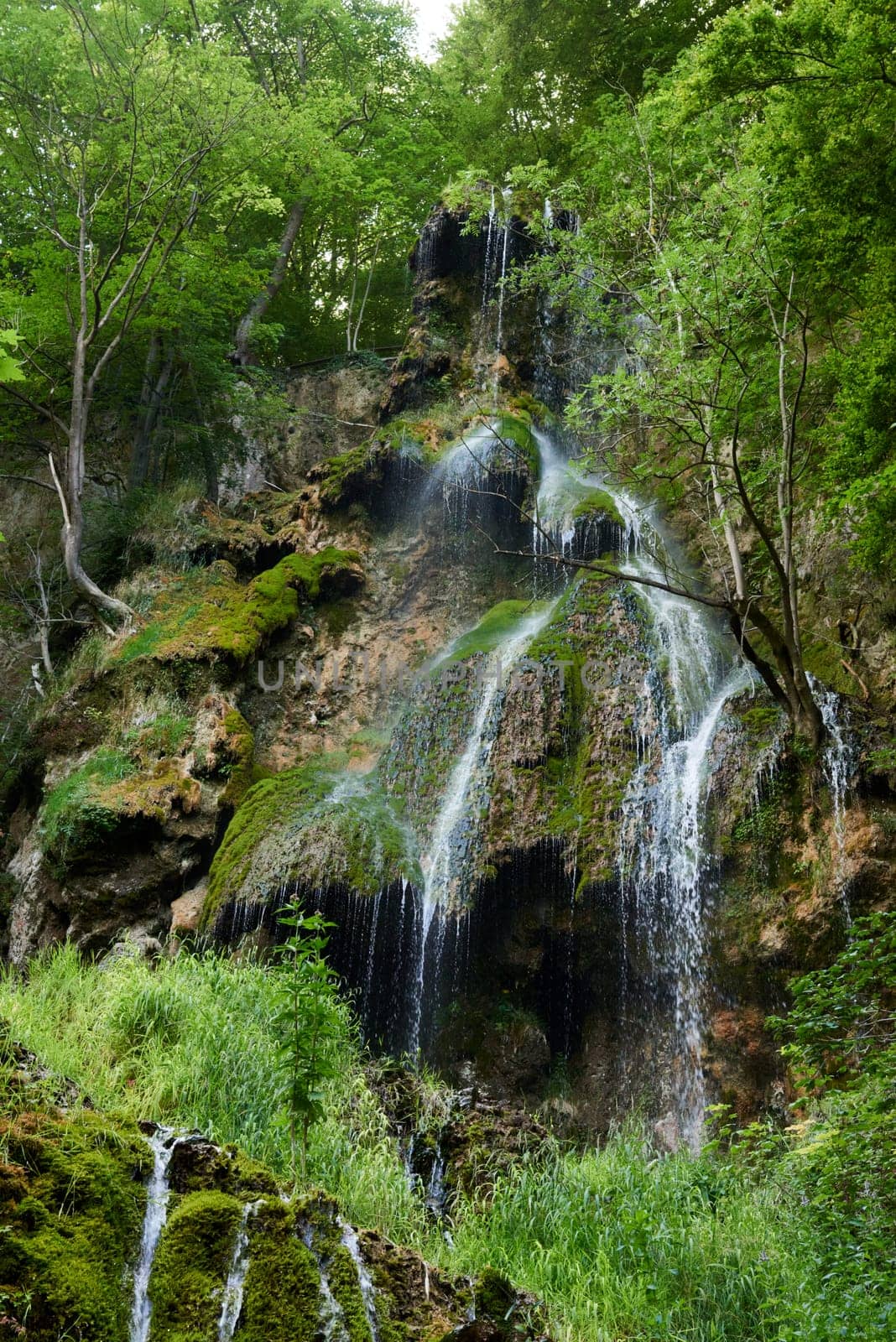 Urach Waterfall in Baden-Wurttemberg, Germany During Summer. Urach Waterfall in Baden-Wurttemberg, Germany During Summer by Andrii_Ko