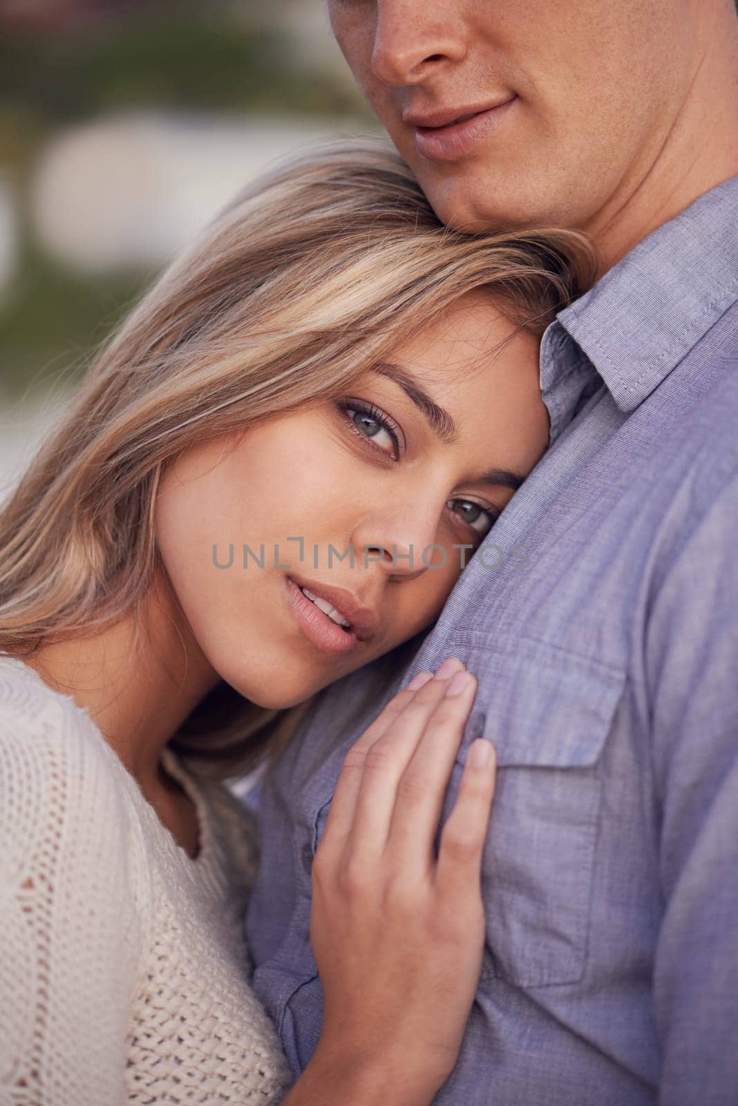 Couple, portrait and hug by outdoor beach, commitment and peace for romance in relationship. People, closeup and security in marriage, embrace and travel on vacation or holiday for bonding in nature.