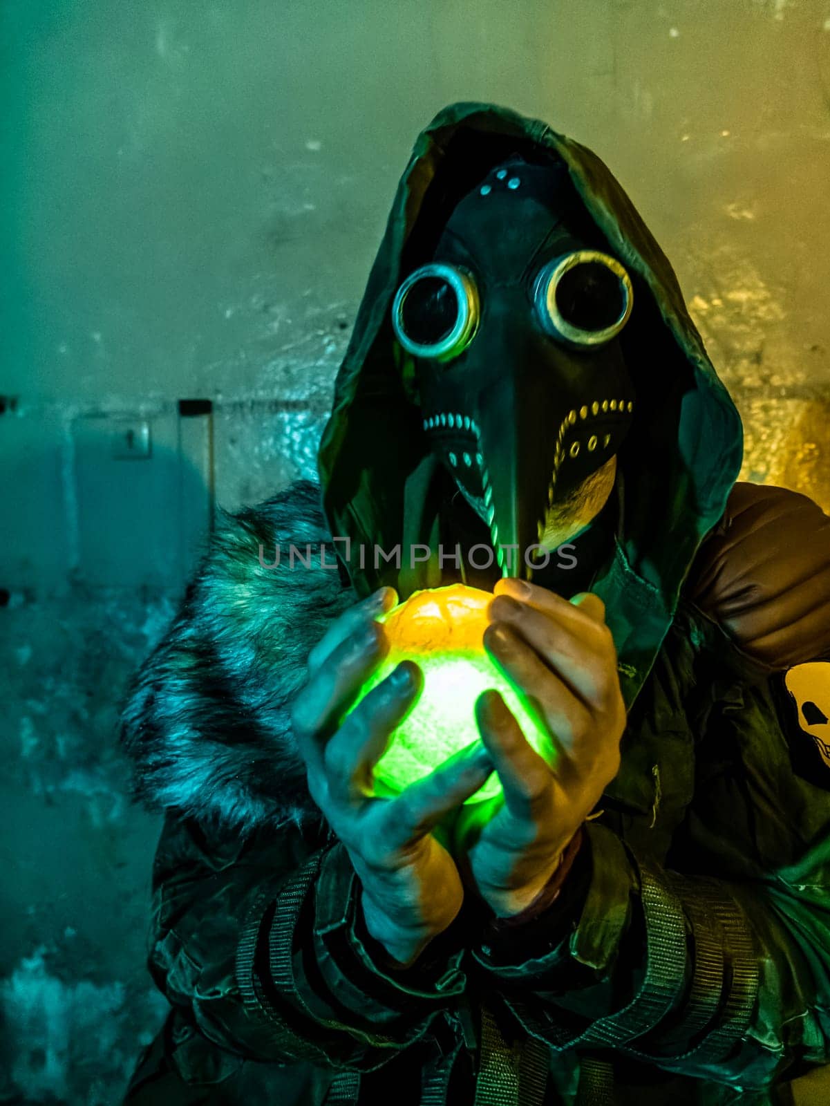 Cosplay of a stalker in a plague doctor mask holding a mysterious luminous artifact. art photo by lempro