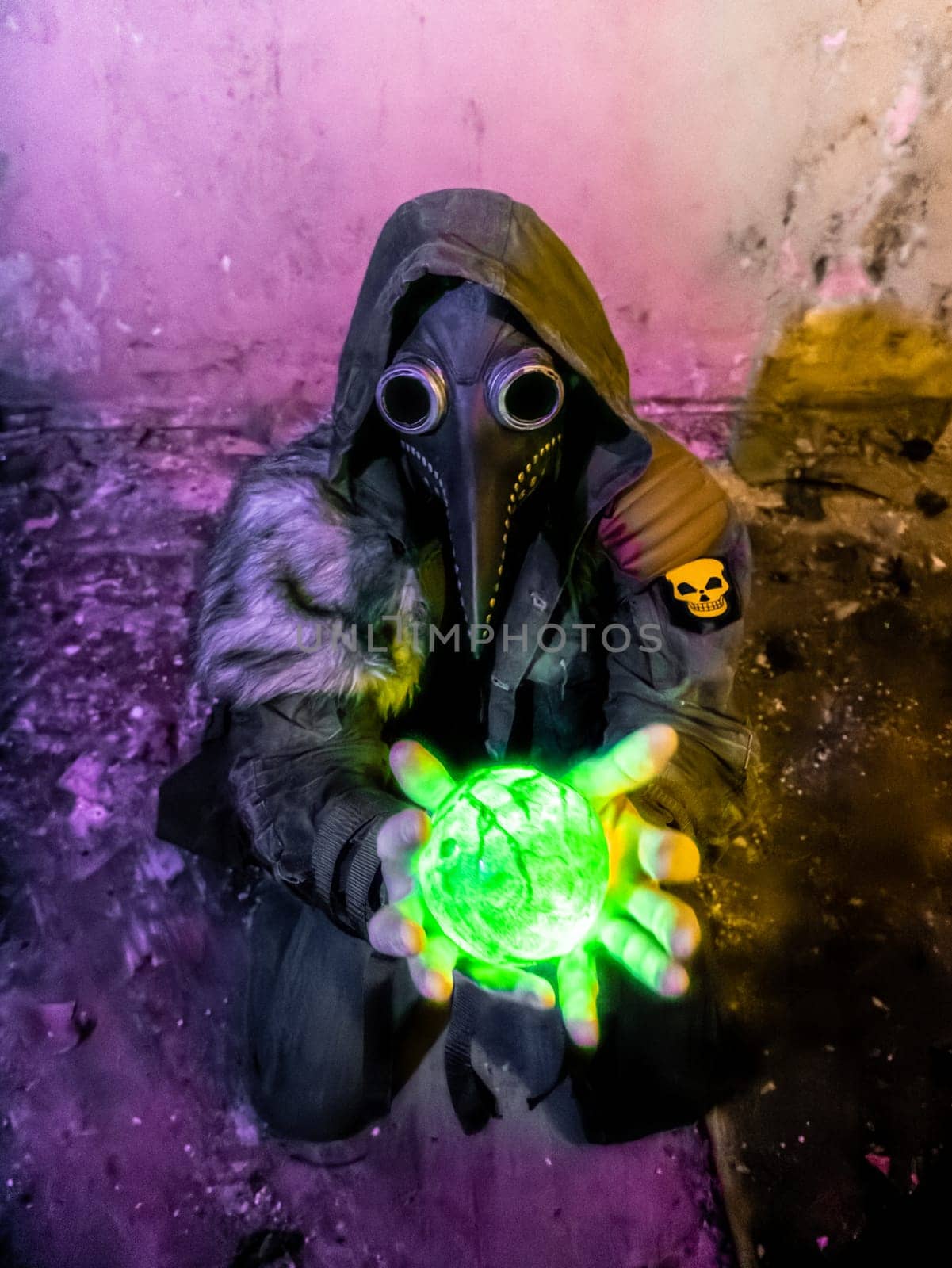 Cosplay of a stalker in a plague doctor mask holding a mysterious luminous artifact. art photo by lempro