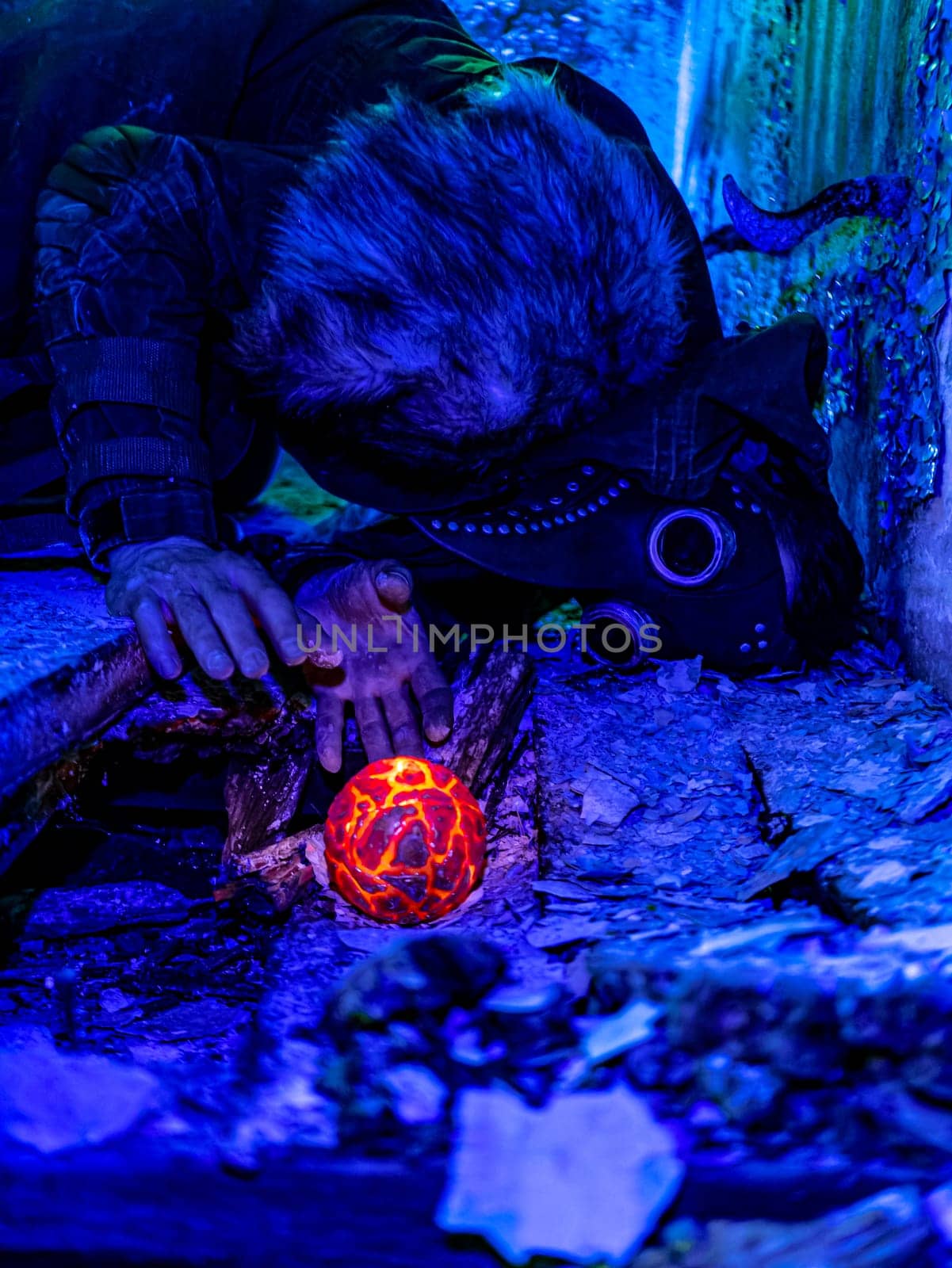 Cosplay of a stalker lying on the floor of an abandoned house in a plague doctor mask and holding a mysterious artifact. art photography by lempro