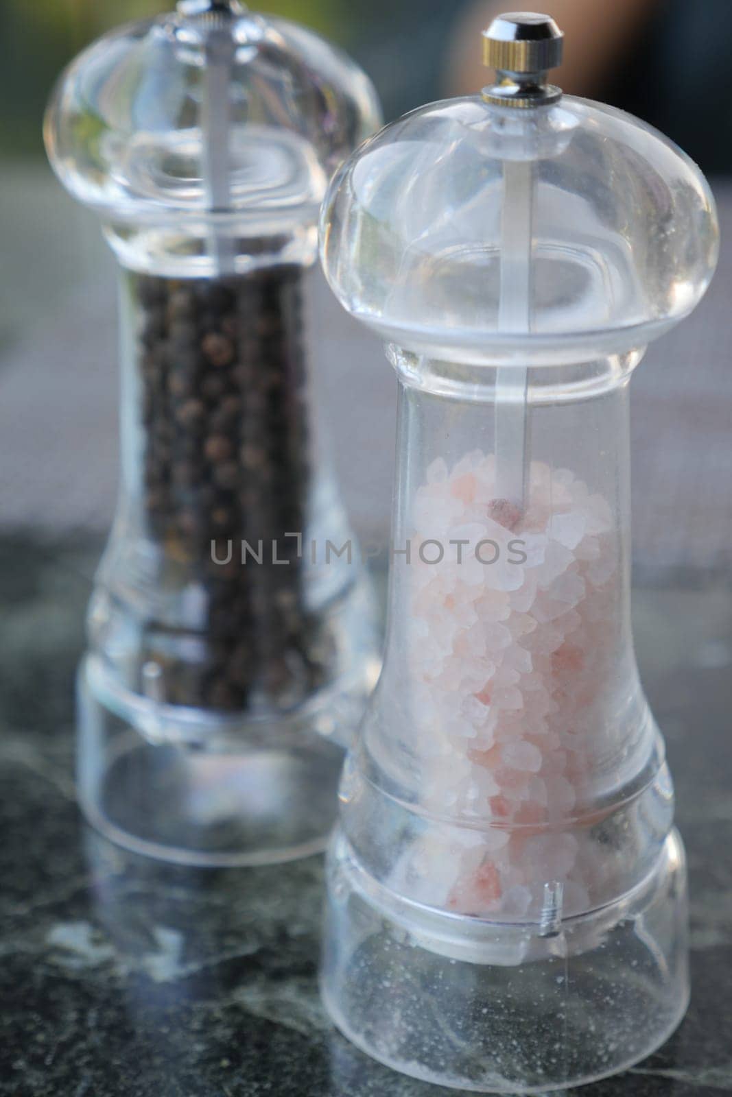 Sea salt crystals in a container on table ,