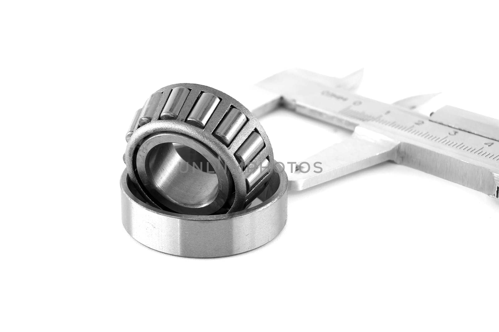Stainless steel cylindrical roller bearing with an inner ring isolated on white background