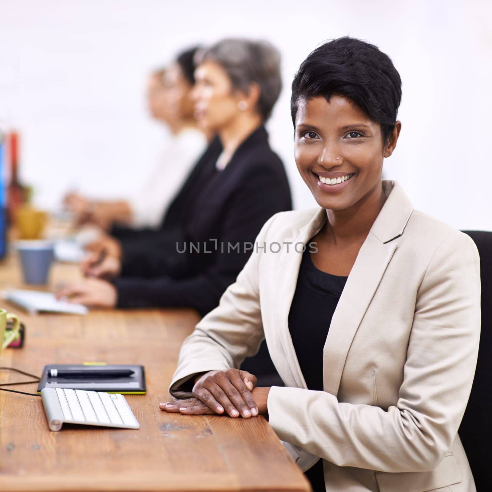Happy woman, portrait and professional with confidence at office for business, design or creative startup. Face of female person, agent or employee with smile, career ambition or agency at workplace by YuriArcurs