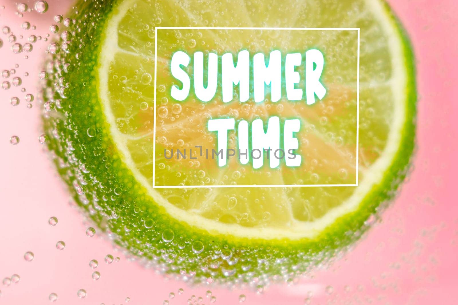 Summer, highlighted by the effervescent bubbles clinging to a submerged lime slice surrounded by a welcoming Summer Time message. by darksoul72