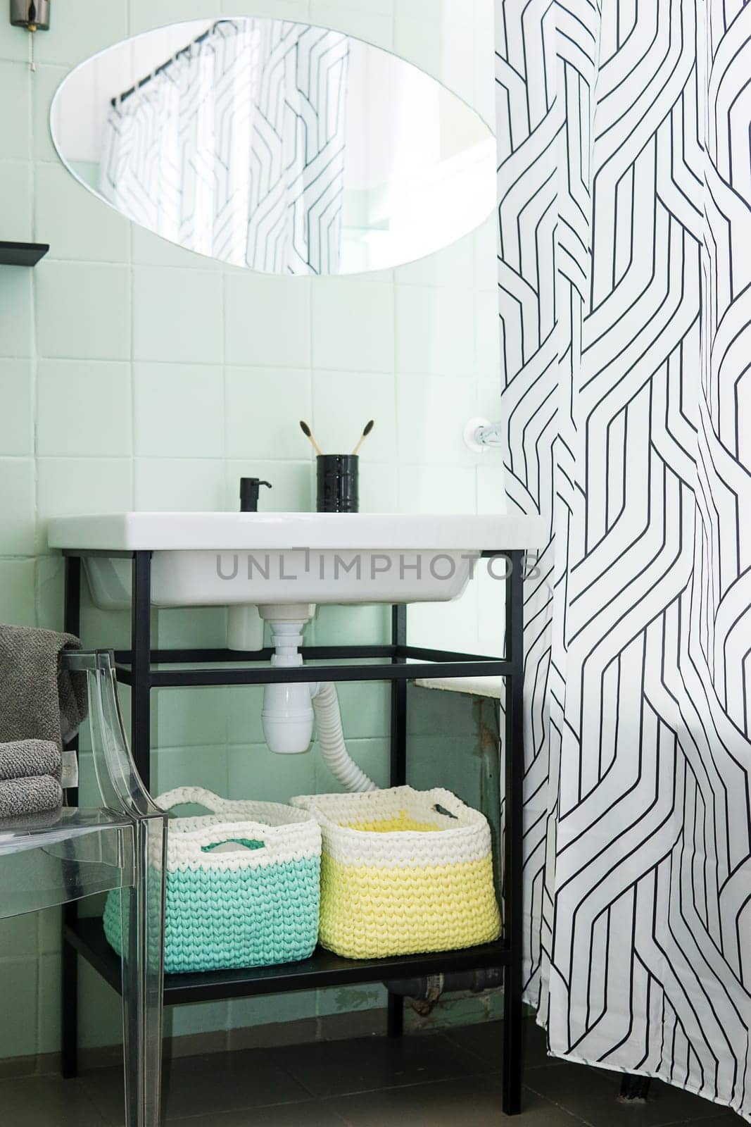 Budget bathroom interior in bright colors. Details of the bathroom interior