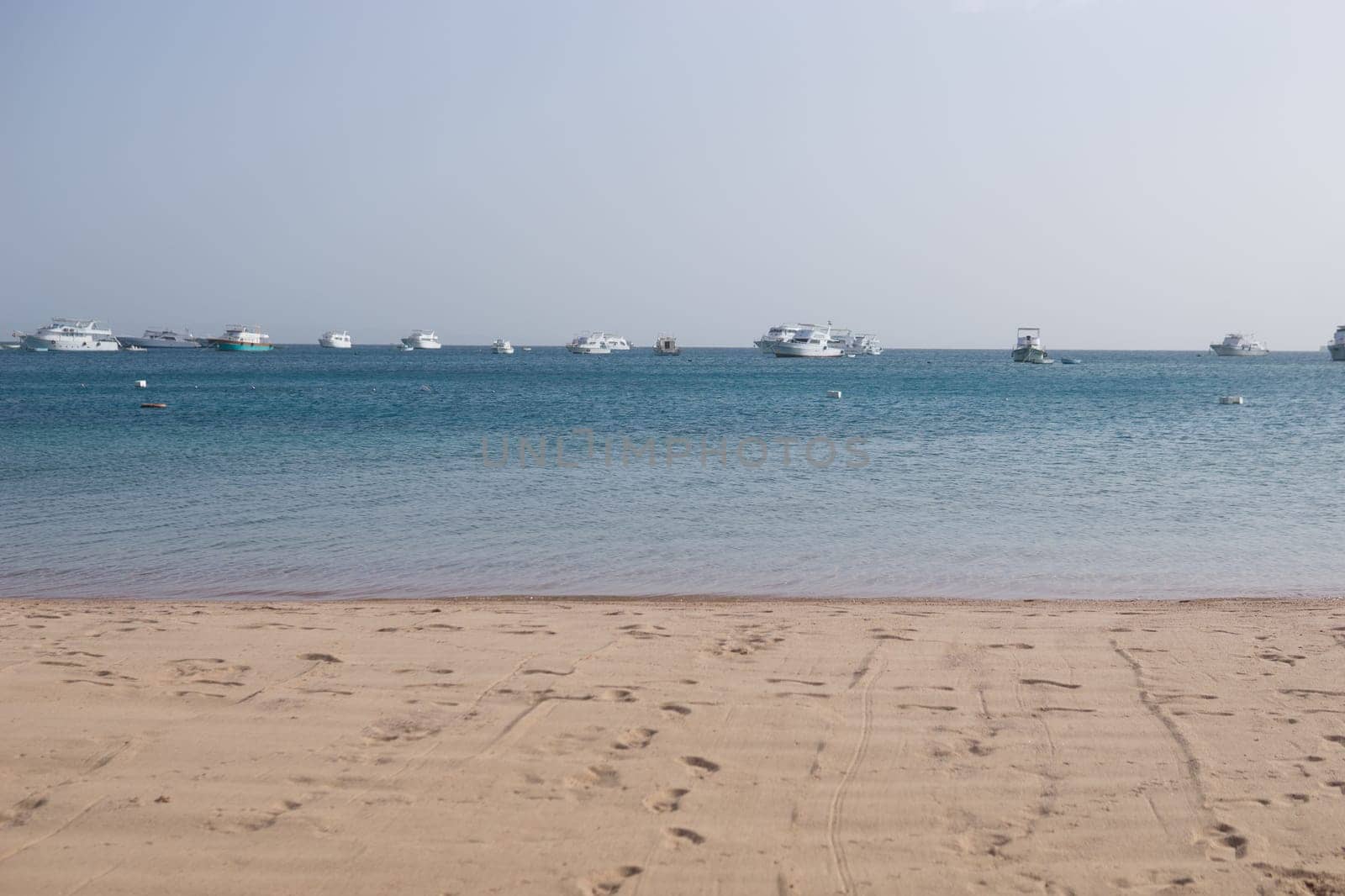 Beach Relaxation at the Red Sea. Fairy-tale Moments of a Sunny Day. The concept of tourism and sea travel.