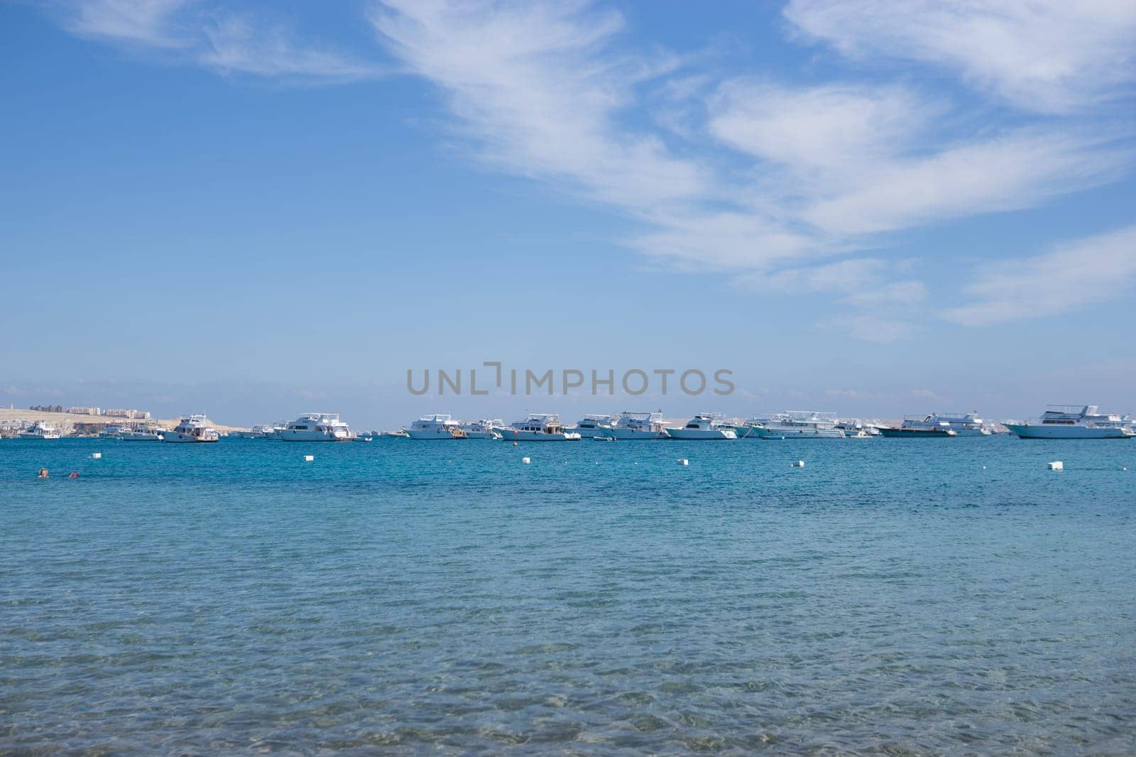 Beach Relaxation at the Red Sea. Fairy-tale Moments of a Sunny Day. The concept of tourism and sea travel.