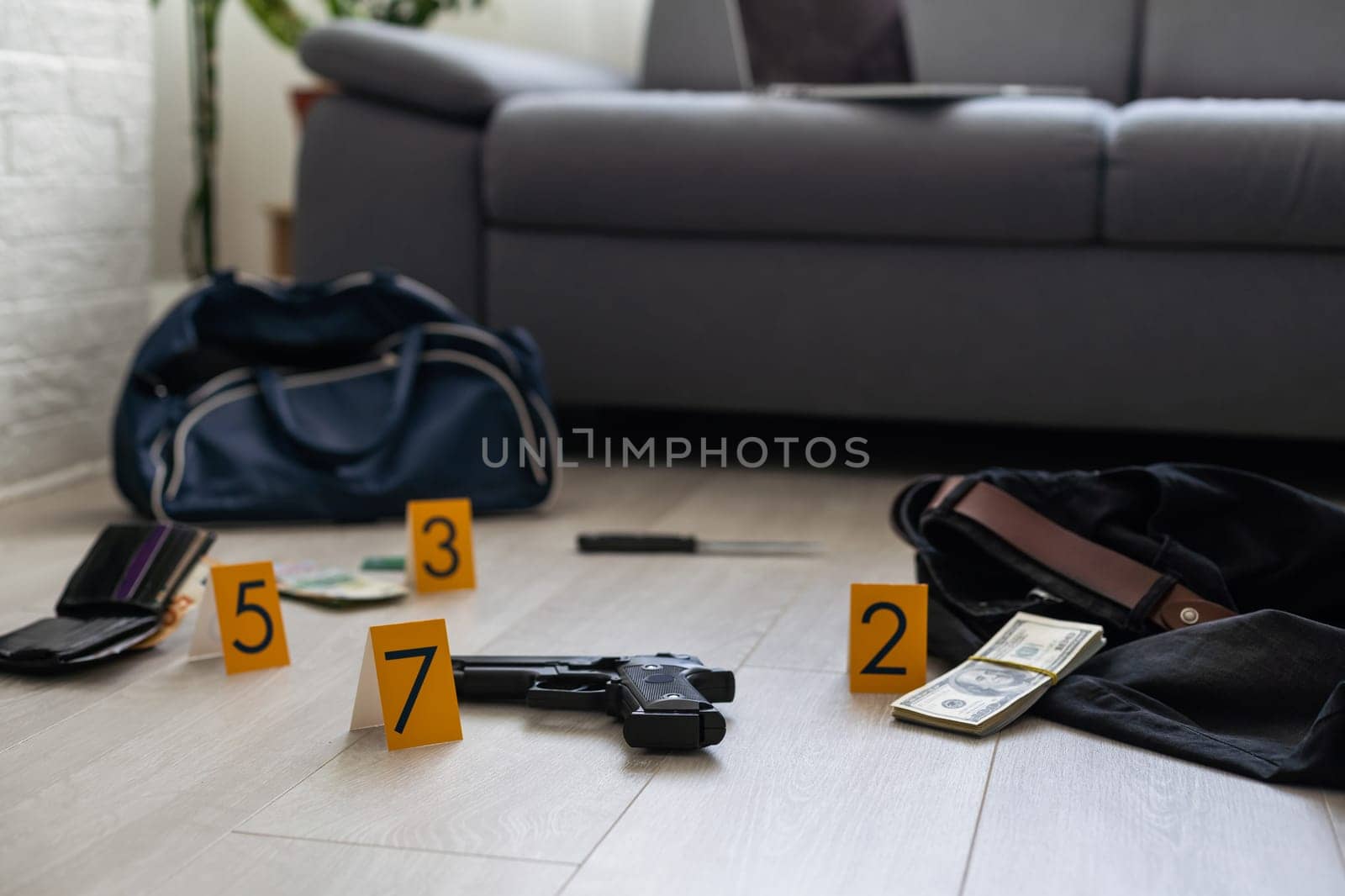 Flat lay composition with evidences and crime scene markers on wooden background. High quality photo