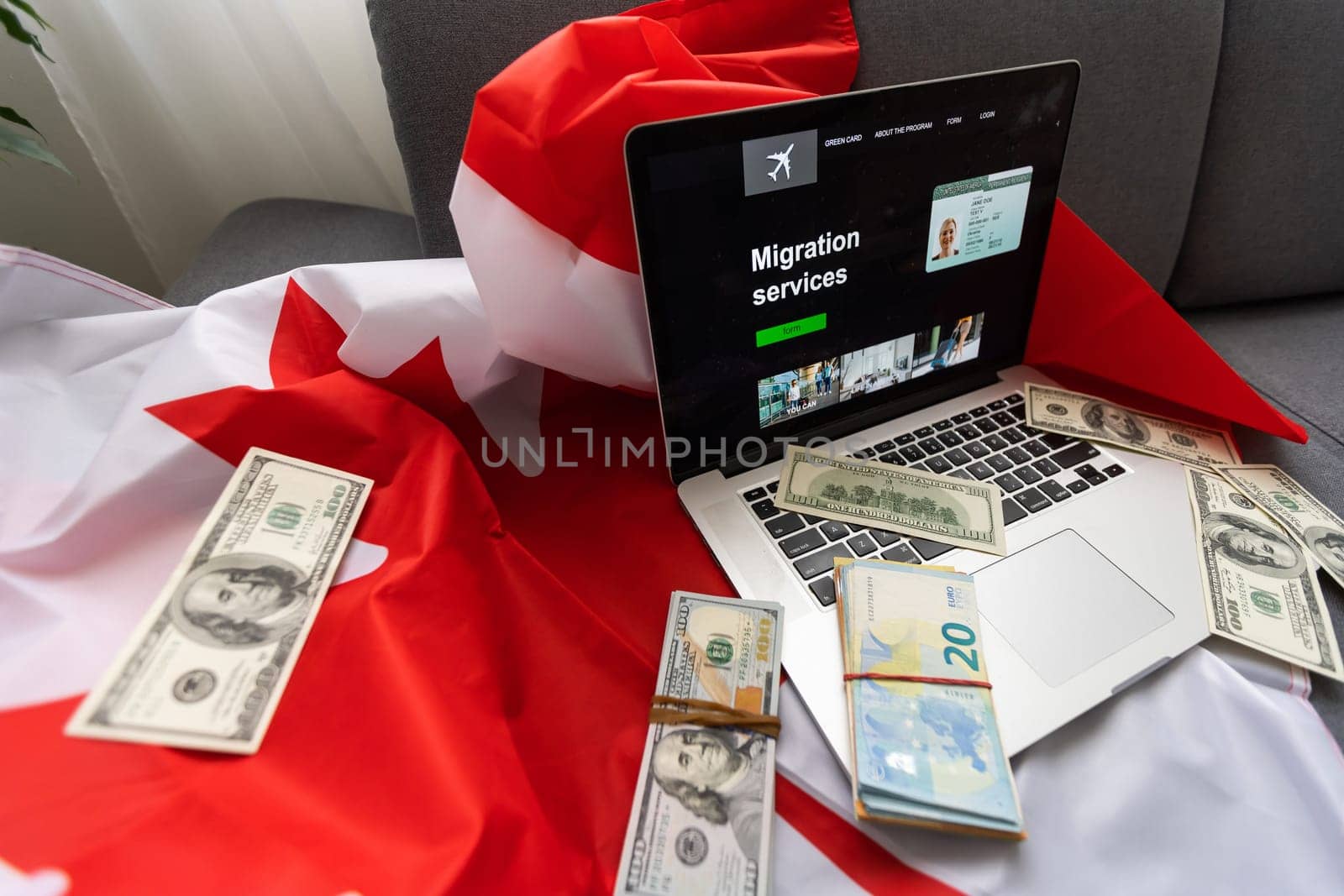 laptop with migration service and Canadian flag by Andelov13
