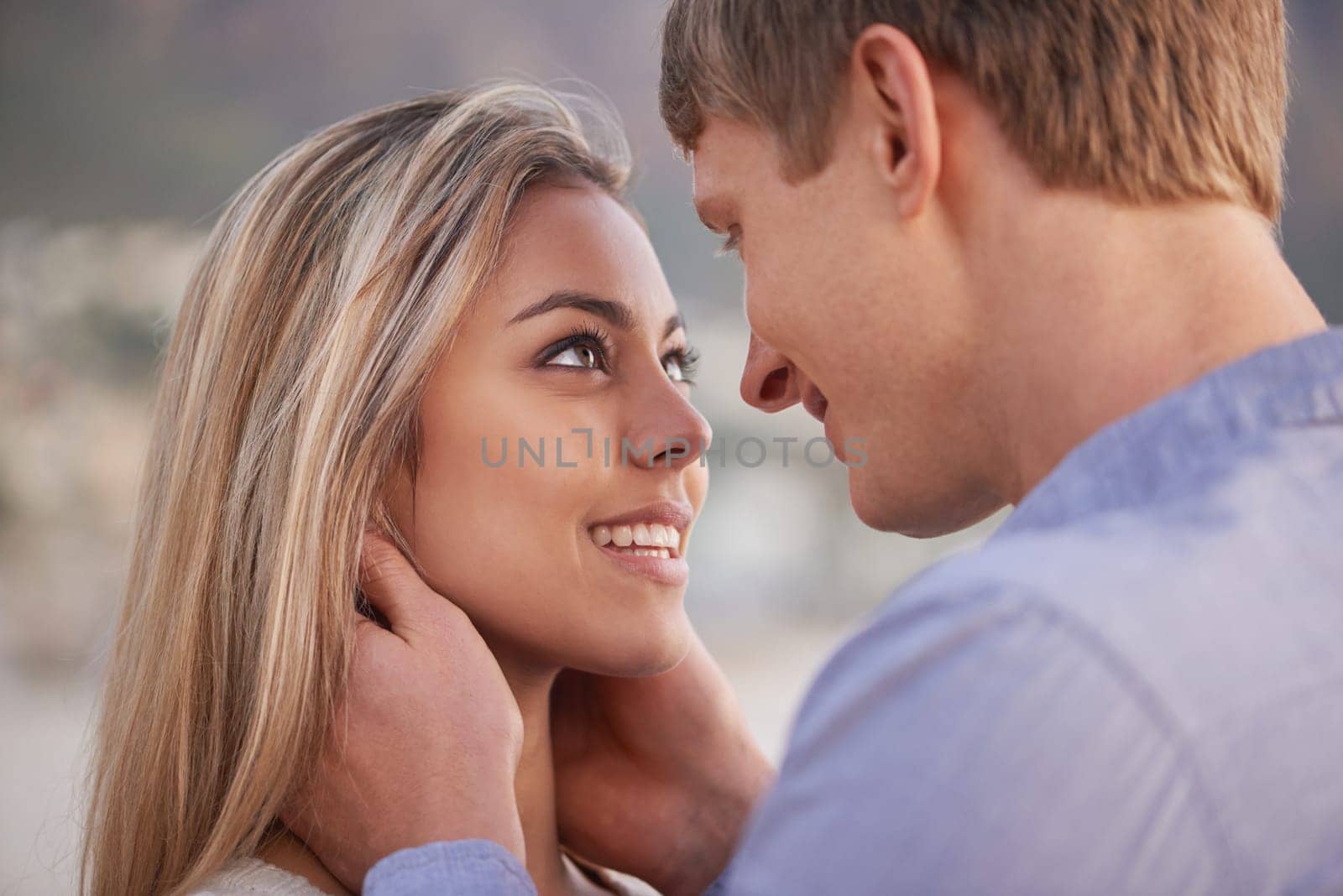 Couple, affection and touch with smile in outdoor for love with romance in honeymoon and vacation in Australia. Closeup, holiday and happy with bonding for relationship, trust and support
