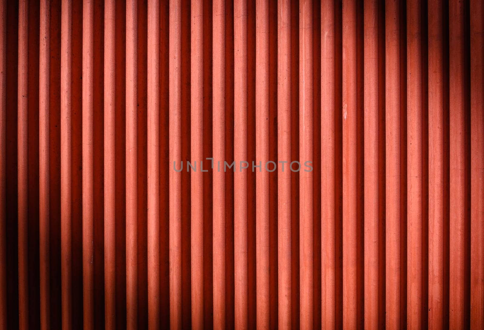 The texture of the fence made of red profiled sheet. Background. Space for text. by Mixa74