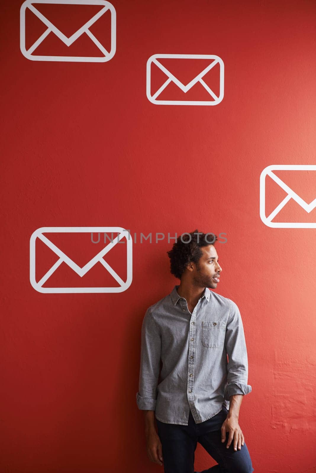 Businessman, entrepreneur and thinking of idea by wall with communication agency for email marketing career. African person, employee and thoughtful for message notification icon with mockup space.