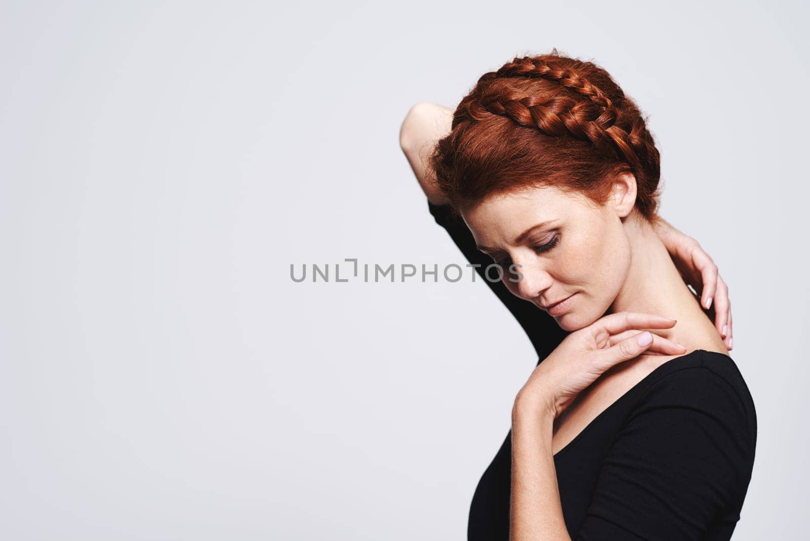 Woman, hair and braid crown for beauty, elegant hairstyle for glamour and redhead on white background. Haircare, shine and texture in studio with luxury and plait, cosmetic care and mockup space.