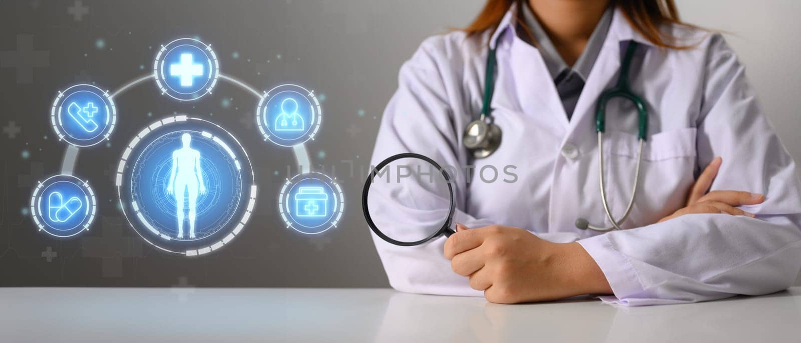 Doctor holding magnifying glass with icons of health care services on a virtual screen. Medical check up concept. by prathanchorruangsak