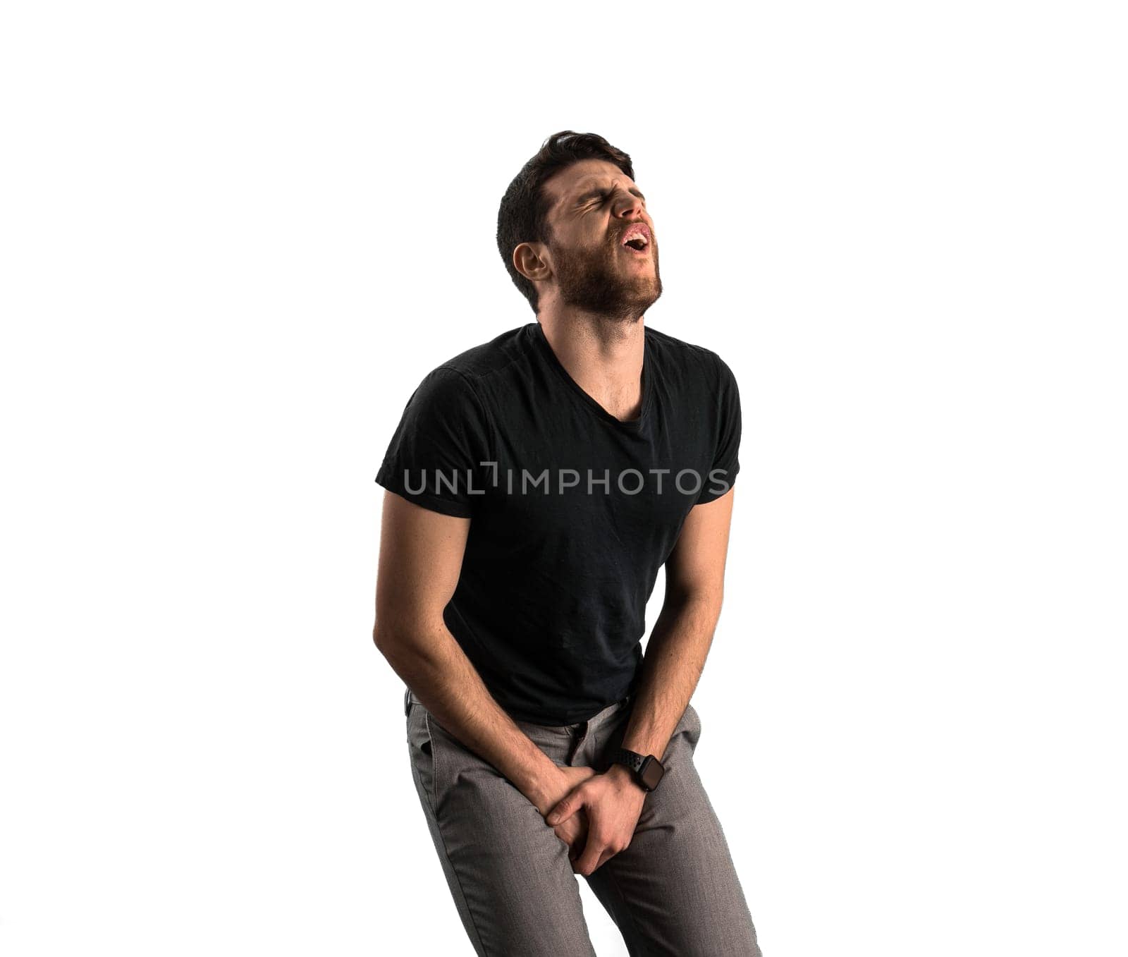 A man sitting on a stool in a black shirt by artofphoto