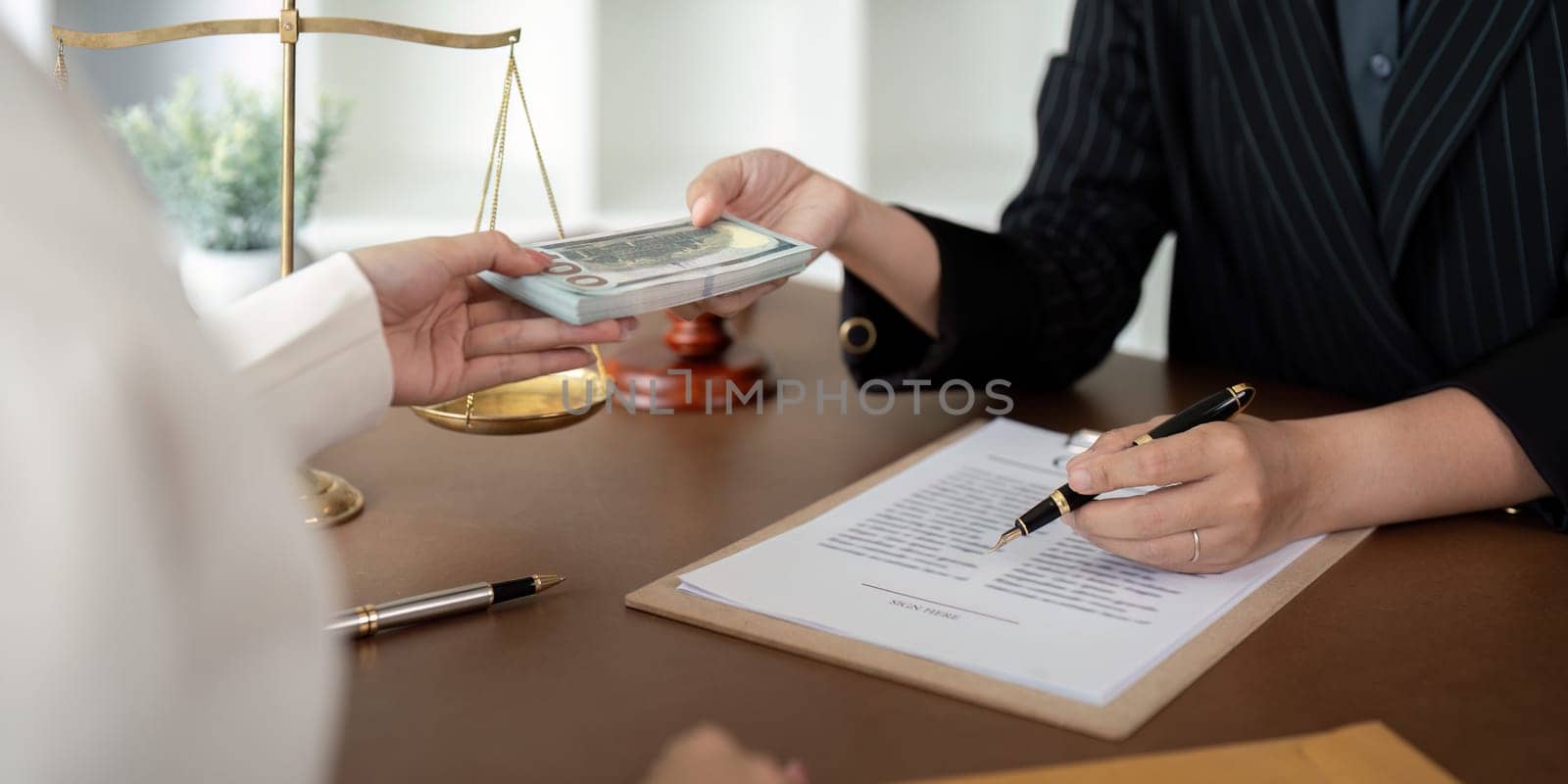 Lawyer or business consultant agree to accept bribe in illegal business. Contract business and bribery before signing the contract.