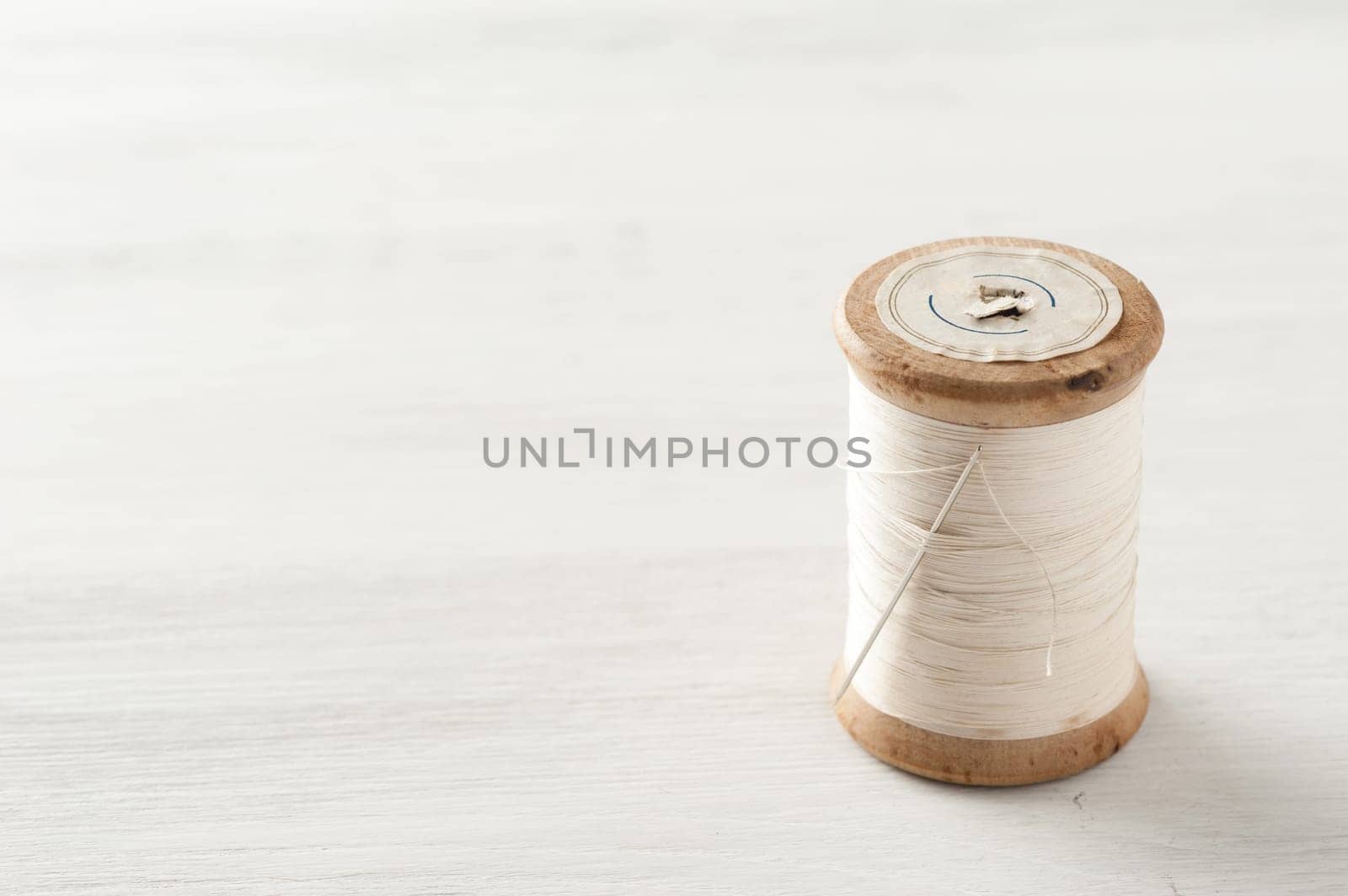 closeup thread for sewing and needlework, old reel of thread