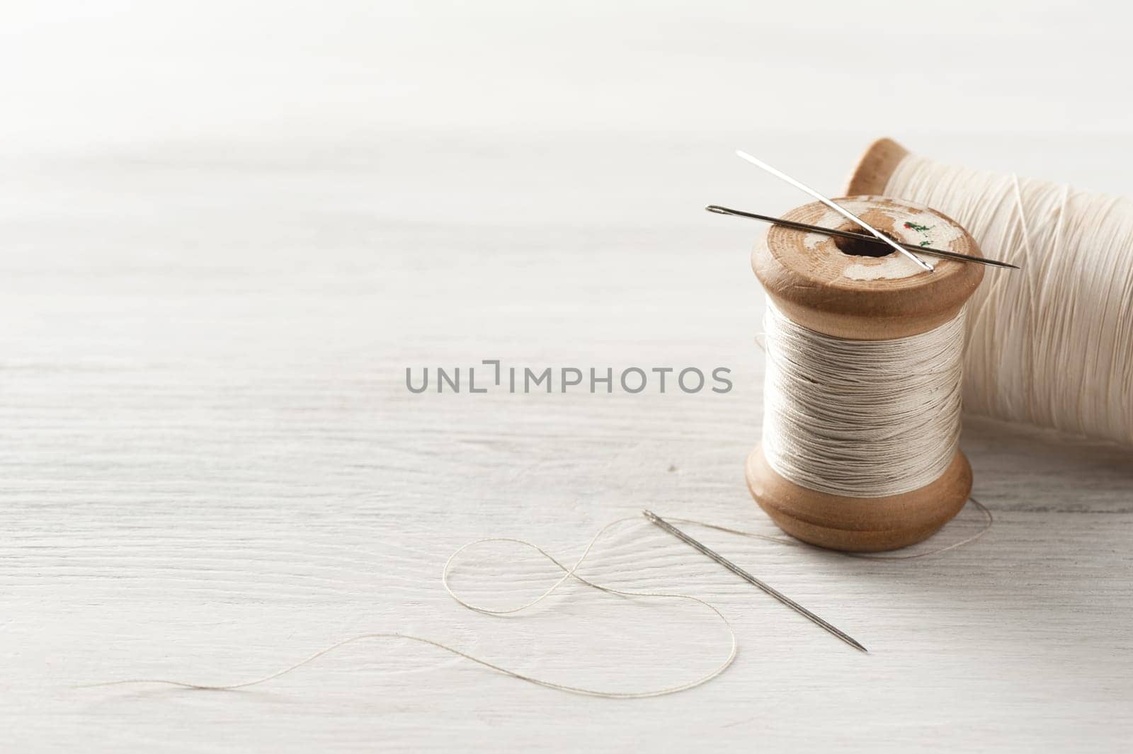 closeup thread for sewing and needlework, old reel of thread