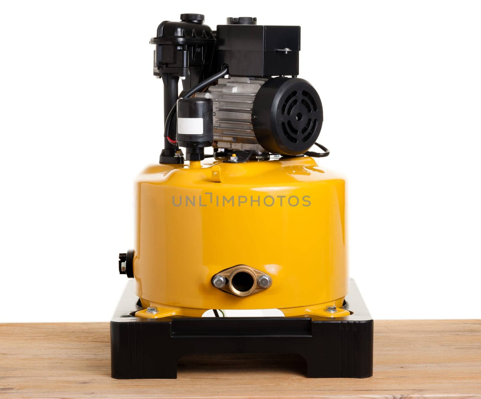 Yellow automatic water pump isolated over white background