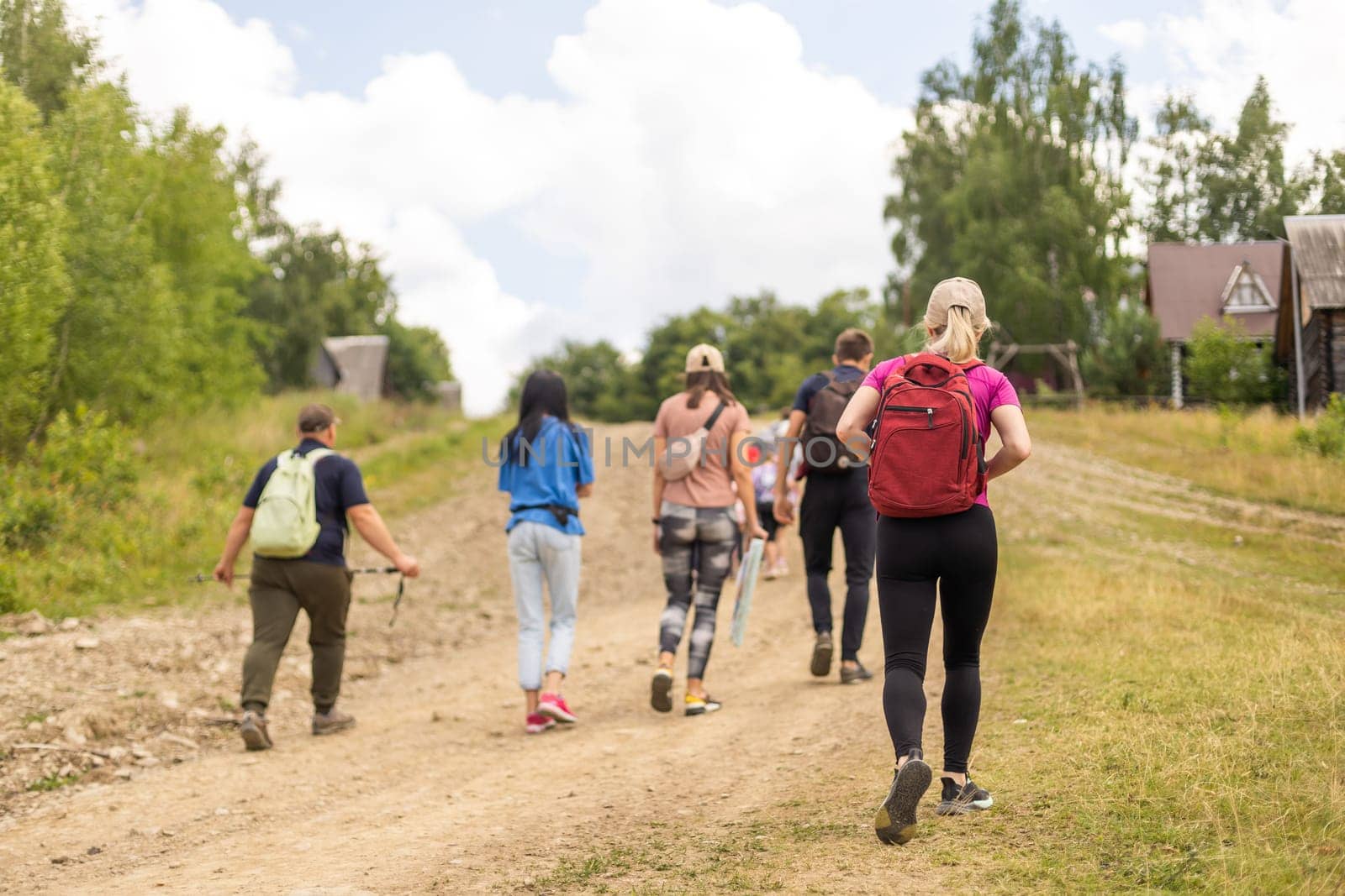 Group of friends hiking in nature in the mountains.