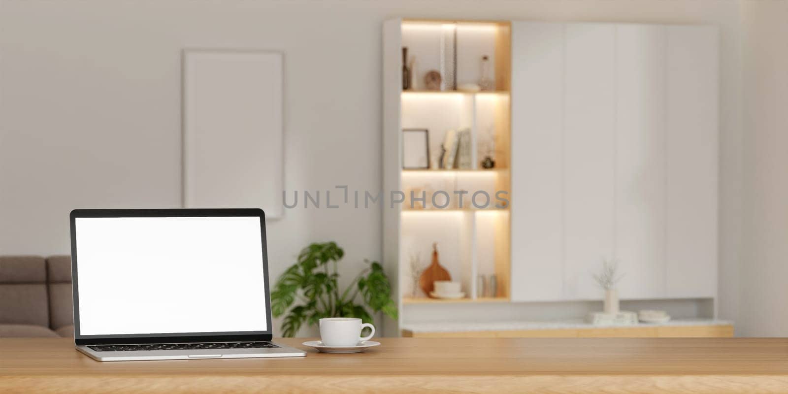 A laptop mockup on the table In minimal living room. on empty white wall background.3d render illustration by meepiangraphic