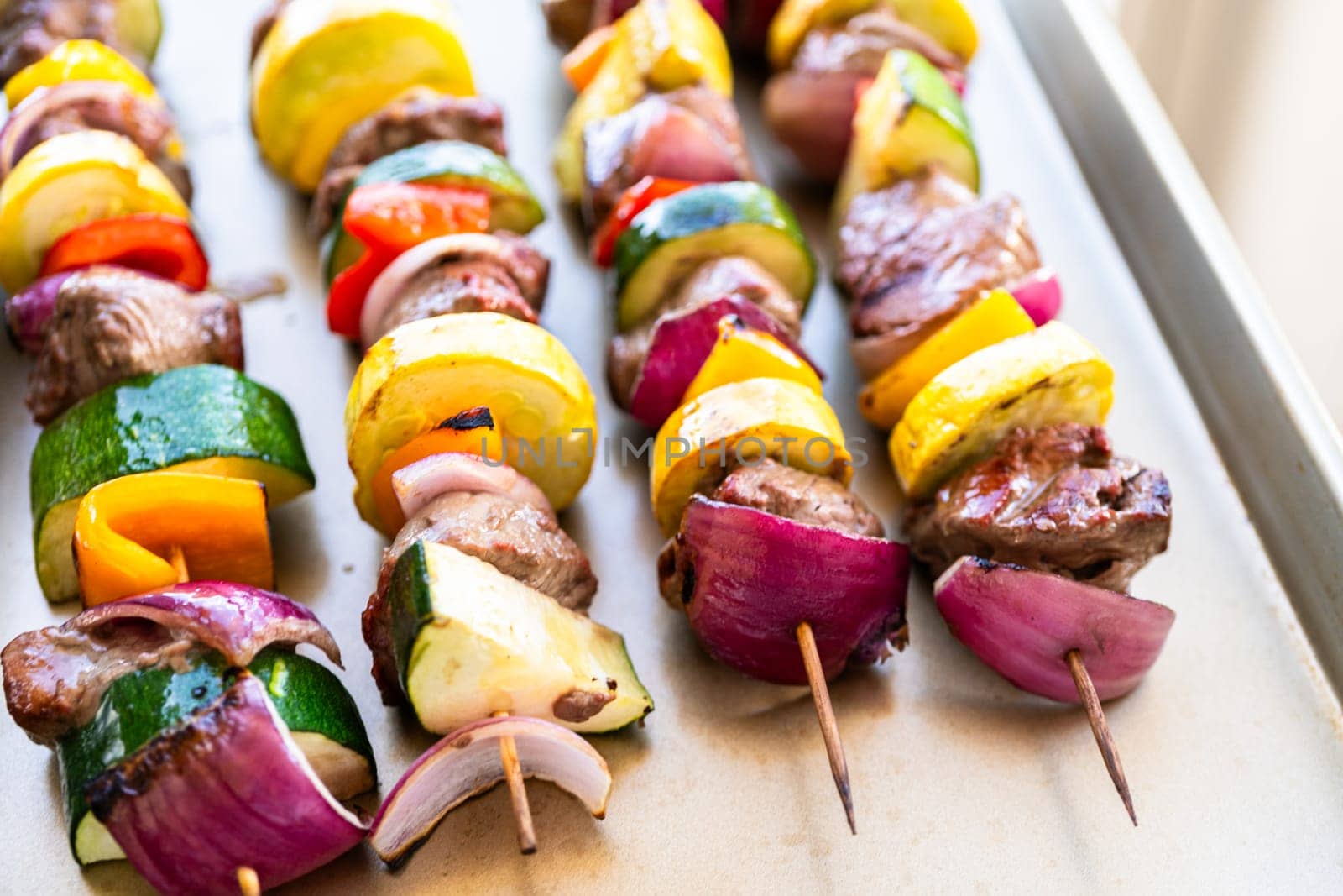 Grill Delights-Beef and Veggies Sizzling on Skewer by arinahabich