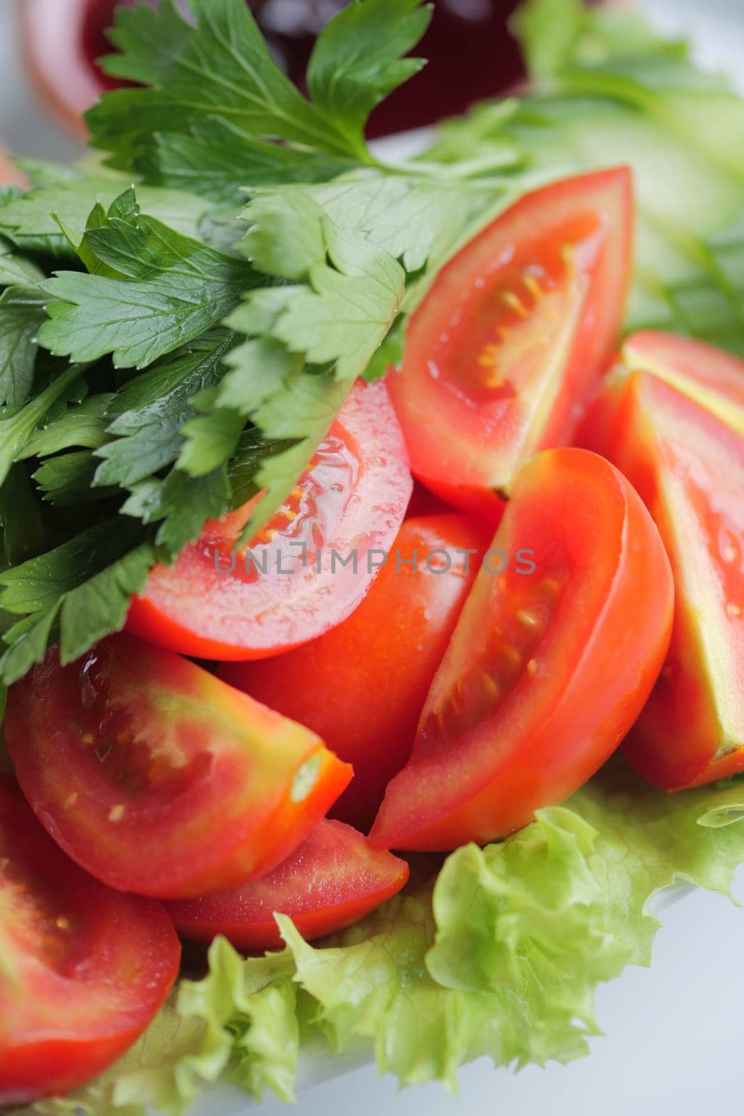 cherry tomato slices on table .