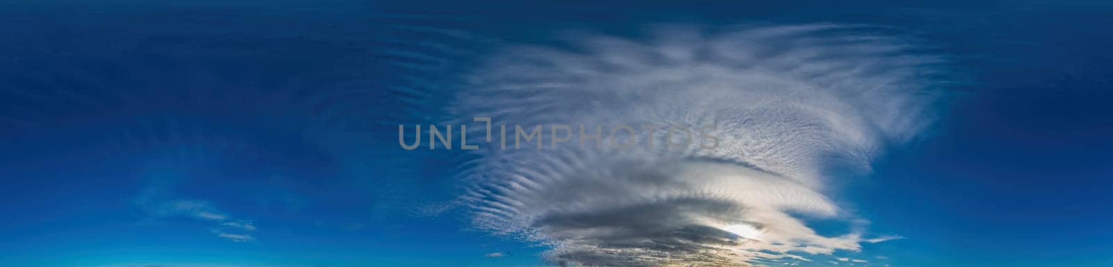 Blue sky with Cirrus clouds Seamless panorama in spherical equirectangular format. Complete zenith for use in 3D graphics, game and for composites in aerial drone 360 degree panoramas as a sky dome.